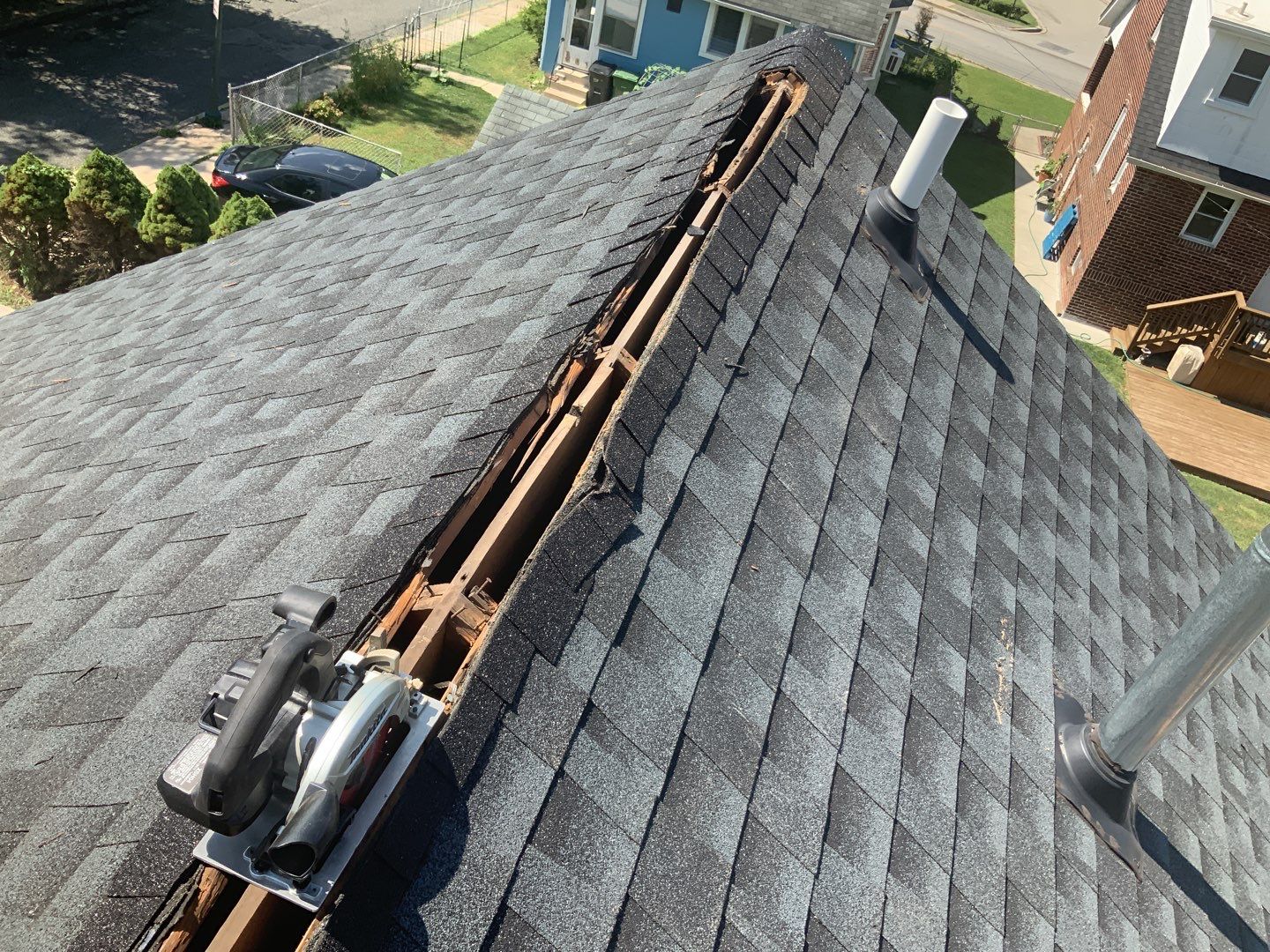 Residential Roofing Repair using Ridge Vent  by Alpha Design Services