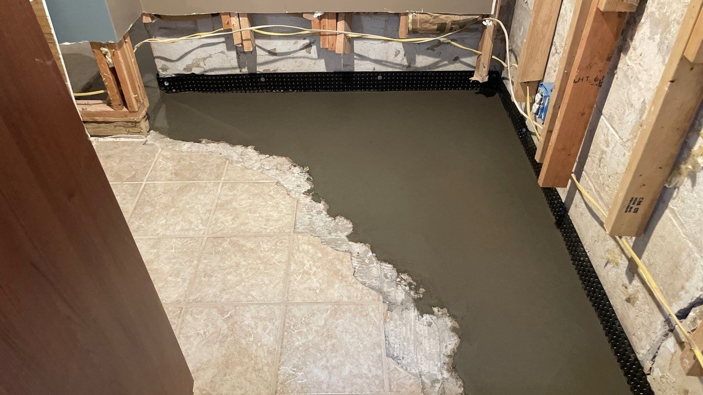 Drain Tile in Minneapolis for Kristen & Taylor by Waterproofing Northeast