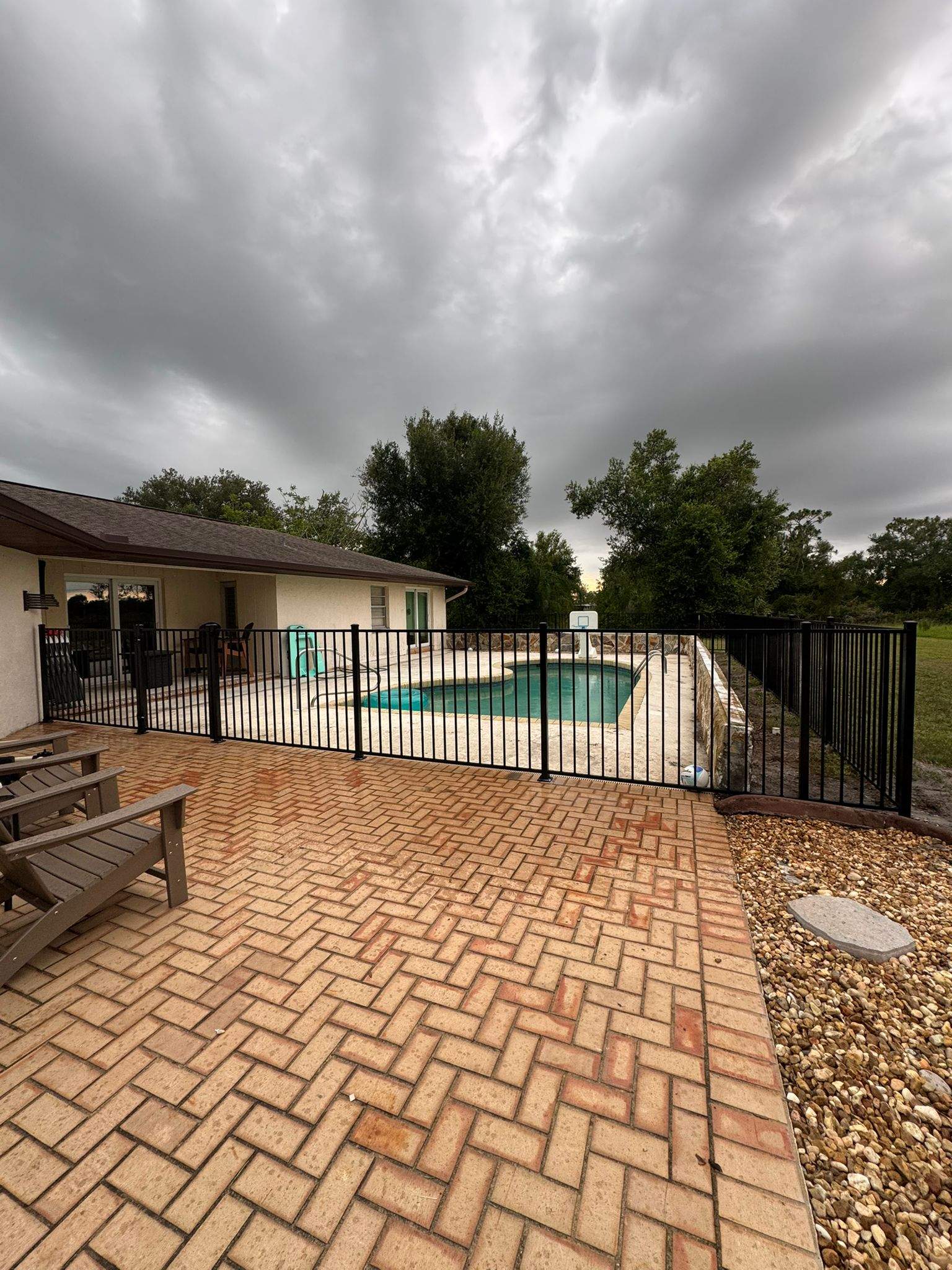 Black Aluminum Pool Safety Fence Installation in Punta Gorda by True Fence LLC