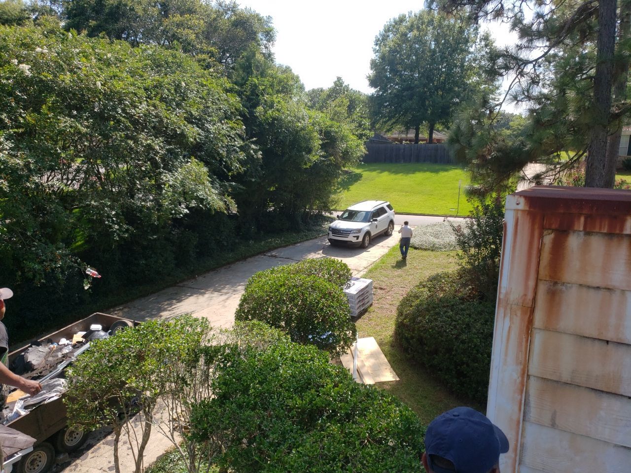 Residential Roofing Installation using Roof Replacement by American Roofing & Construction LLC