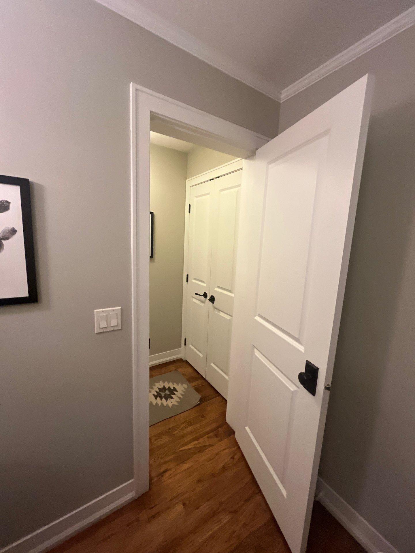 Sioux Falls Interior Painting with Custom Wainscoting and Decorative Wallpaper by Select Painting, Coatings & Garage Cabinets