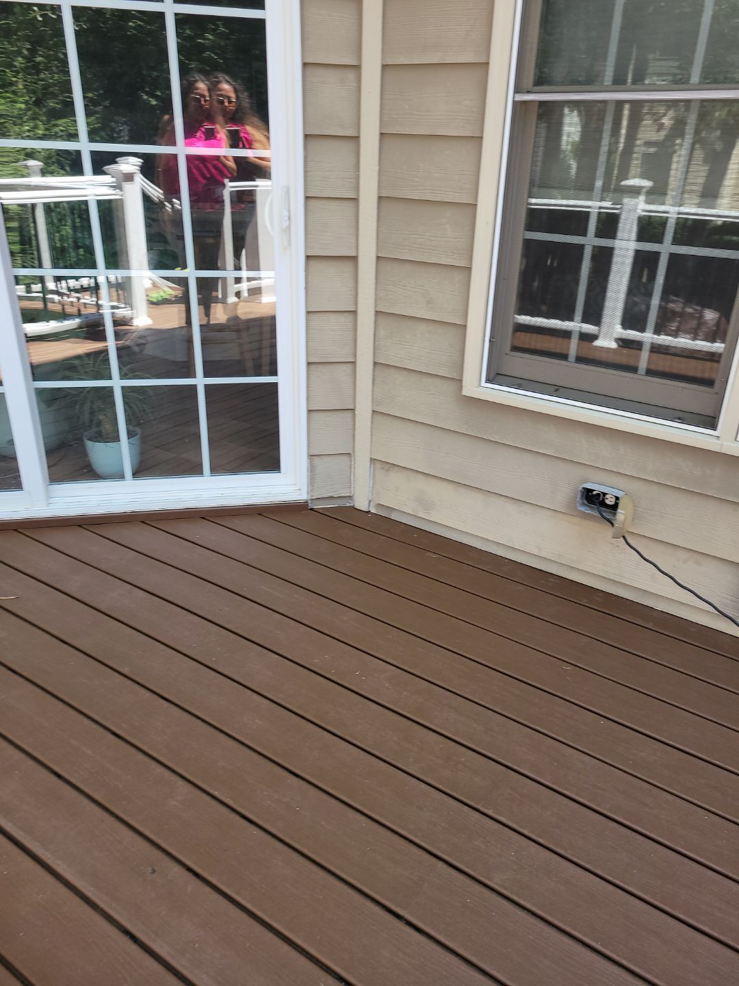 Fuquay-Varina Outdoor Upgrade – Composite Deck & Paved Landing by Elite Remodeling and Design LLC
