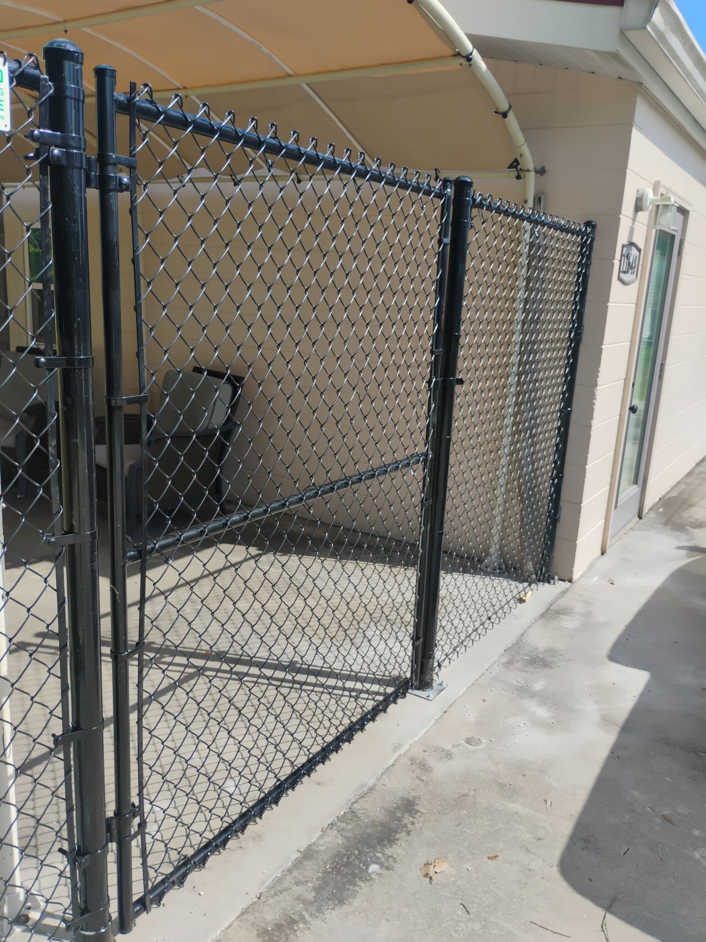 Black Vinyl Chain Link Fence Installation in Arcadia Florida by True Fence LLC