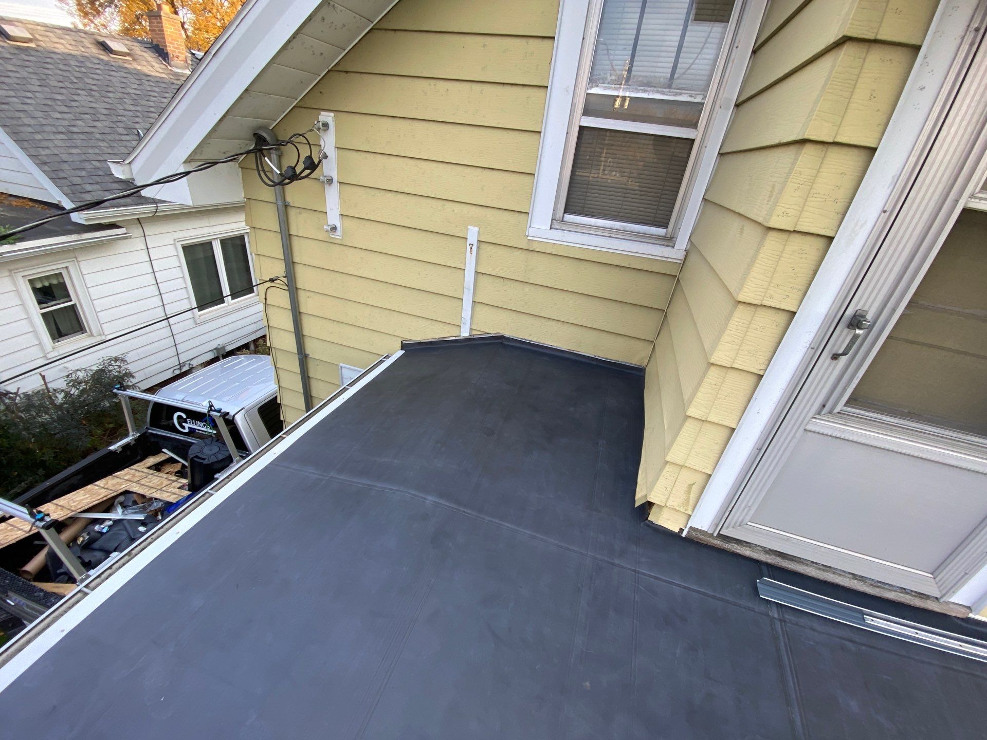 Flat Roof Porch with 60mil EPDM Rubber by Gellings Roofing & Siding
