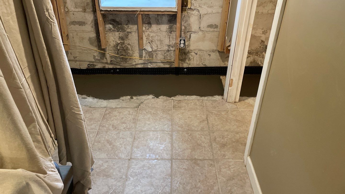 Drain Tile in Minneapolis for Kristen & Taylor by Waterproofing Northeast