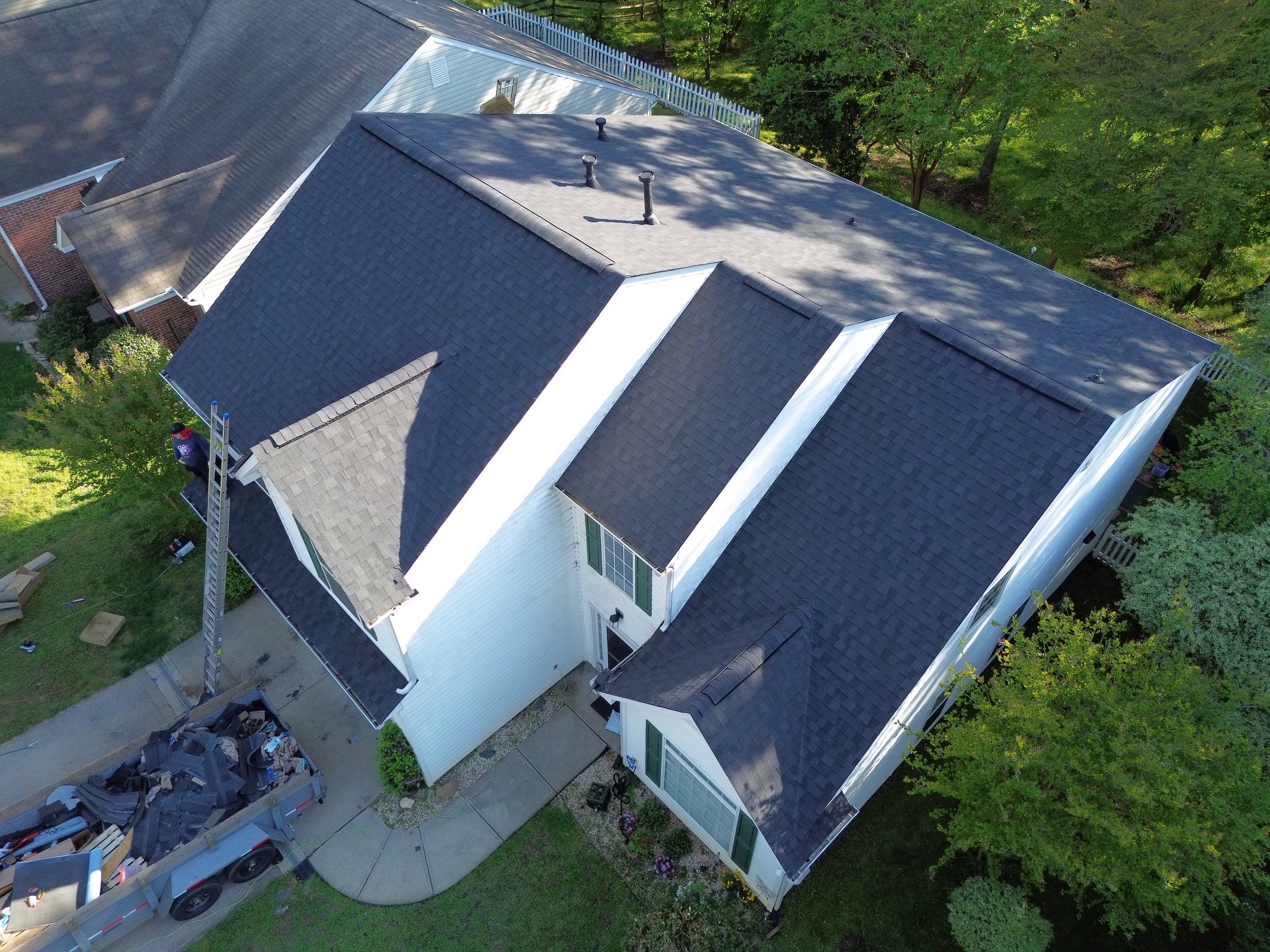Roof and gutter replacement by hail and wind damage by Just Brilliant Restoration JBR
