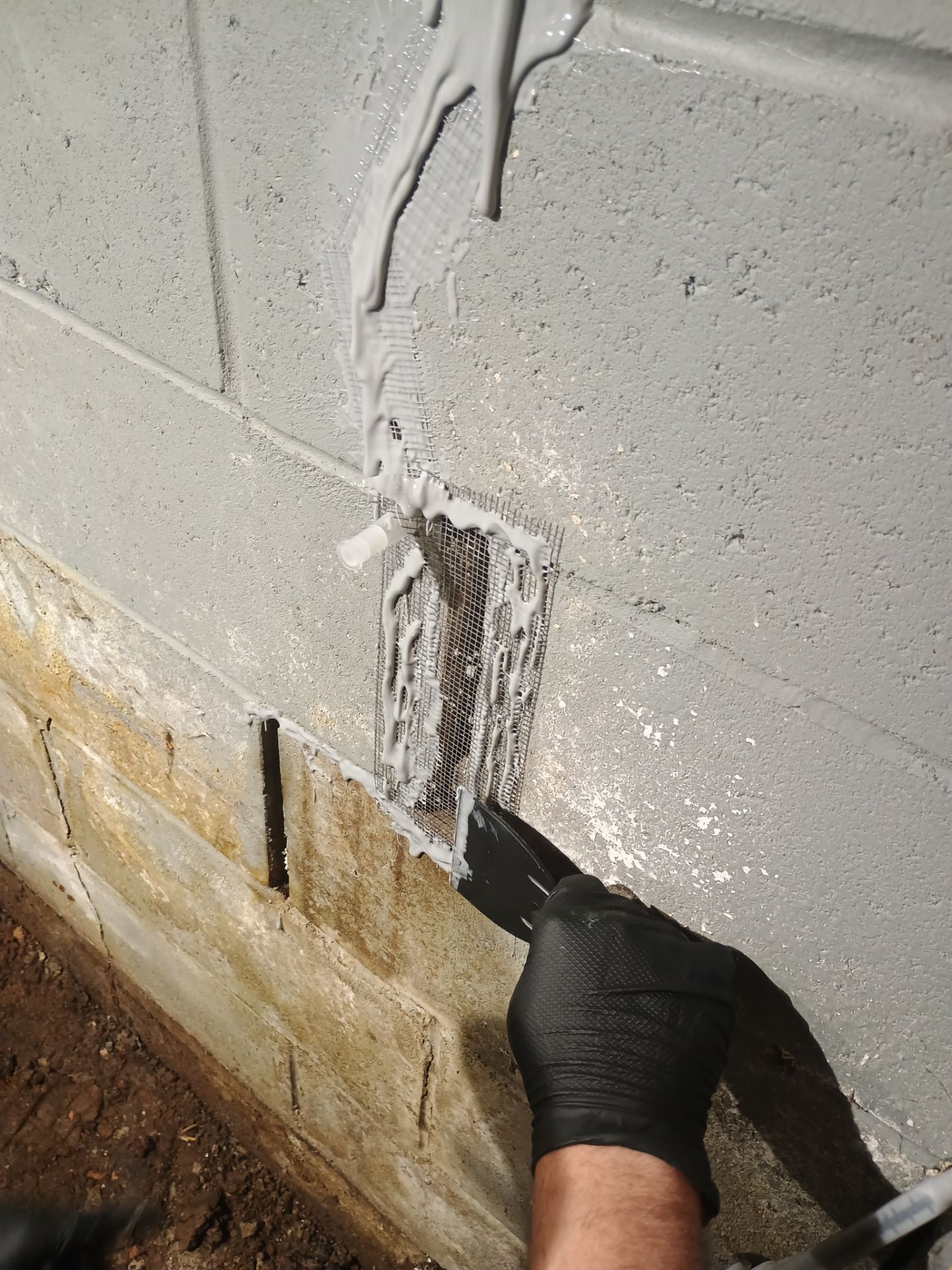 Interior Drain Tile & Sump Pump System in West Minneapolis by Waterproofing Northeast