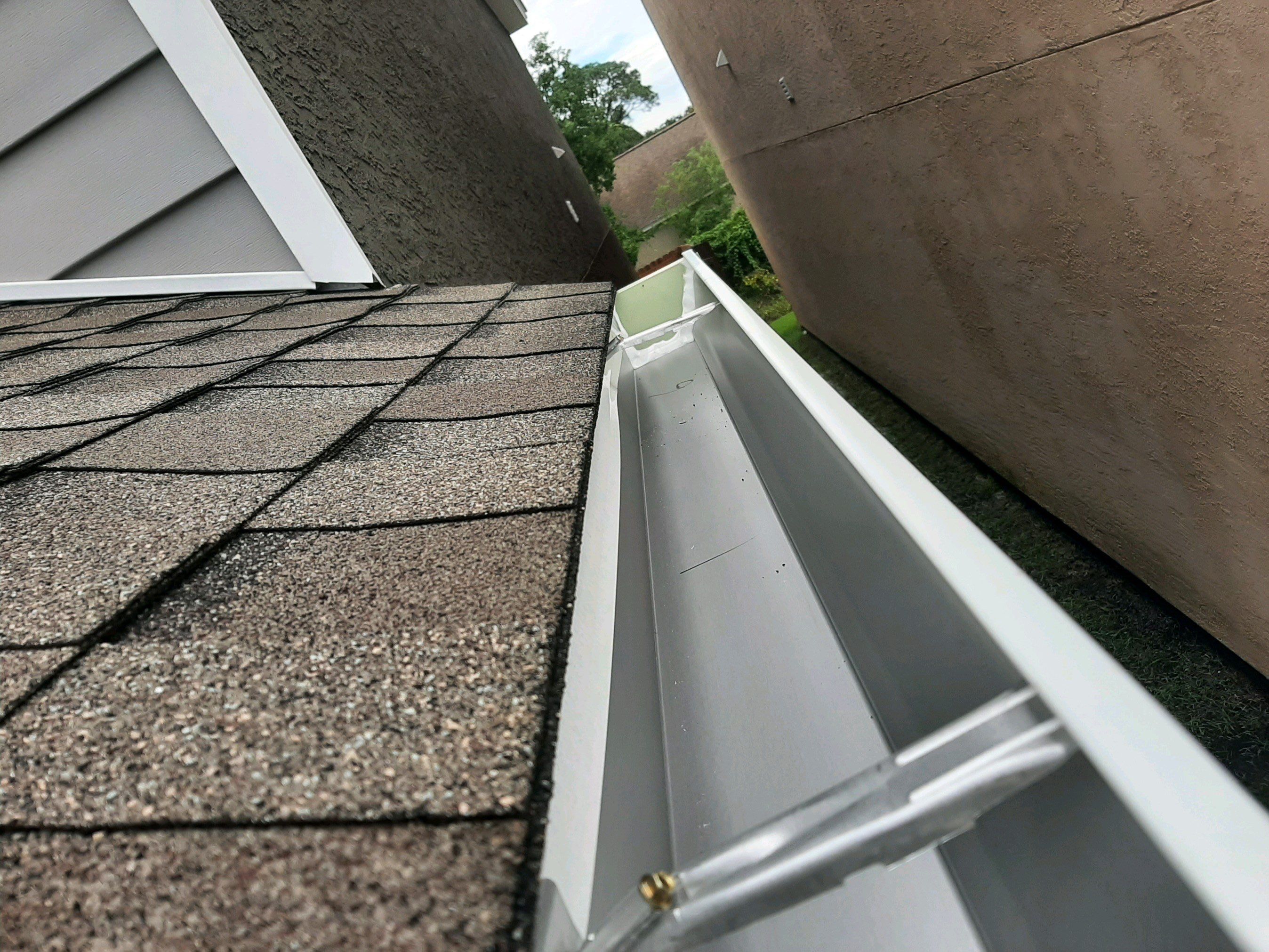 Seamless Gutter Installation using White K-Style Gutters by Gutter Professors
