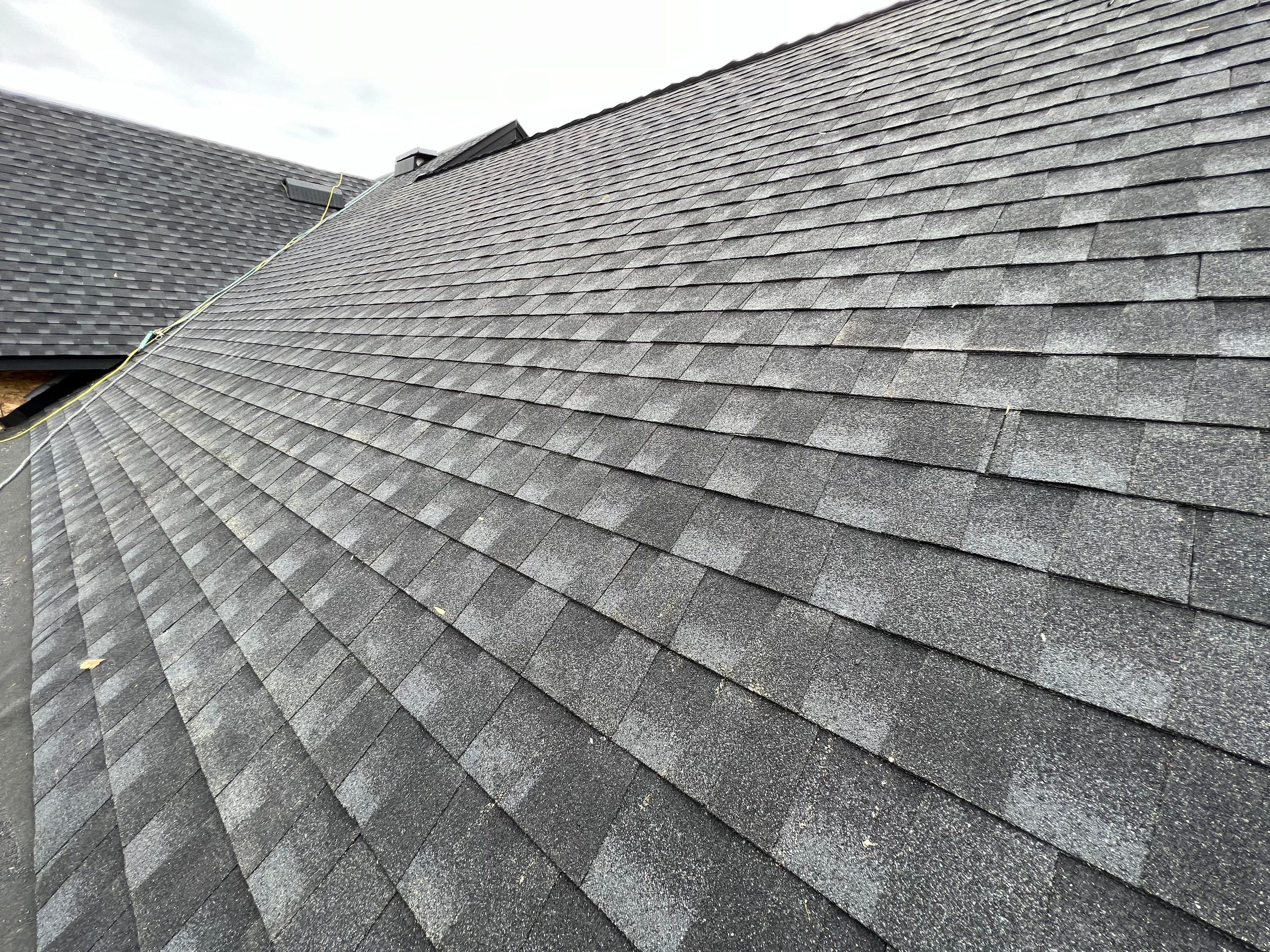 Residential Roofing Installation using GAF Charcoal HDZ by Top Notch Roofing Inc