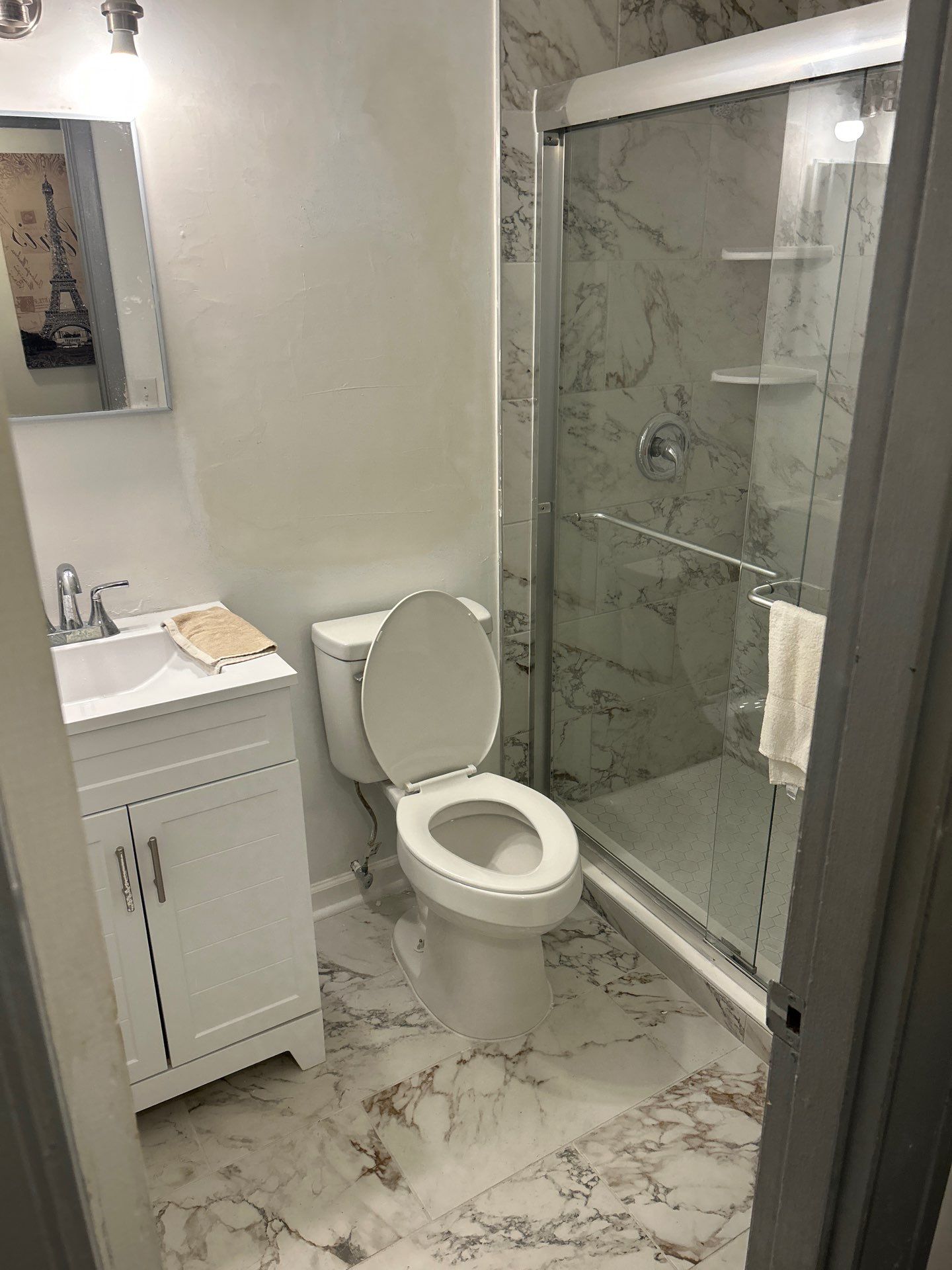 Dual Bathroom Makeover by urban green energy llc