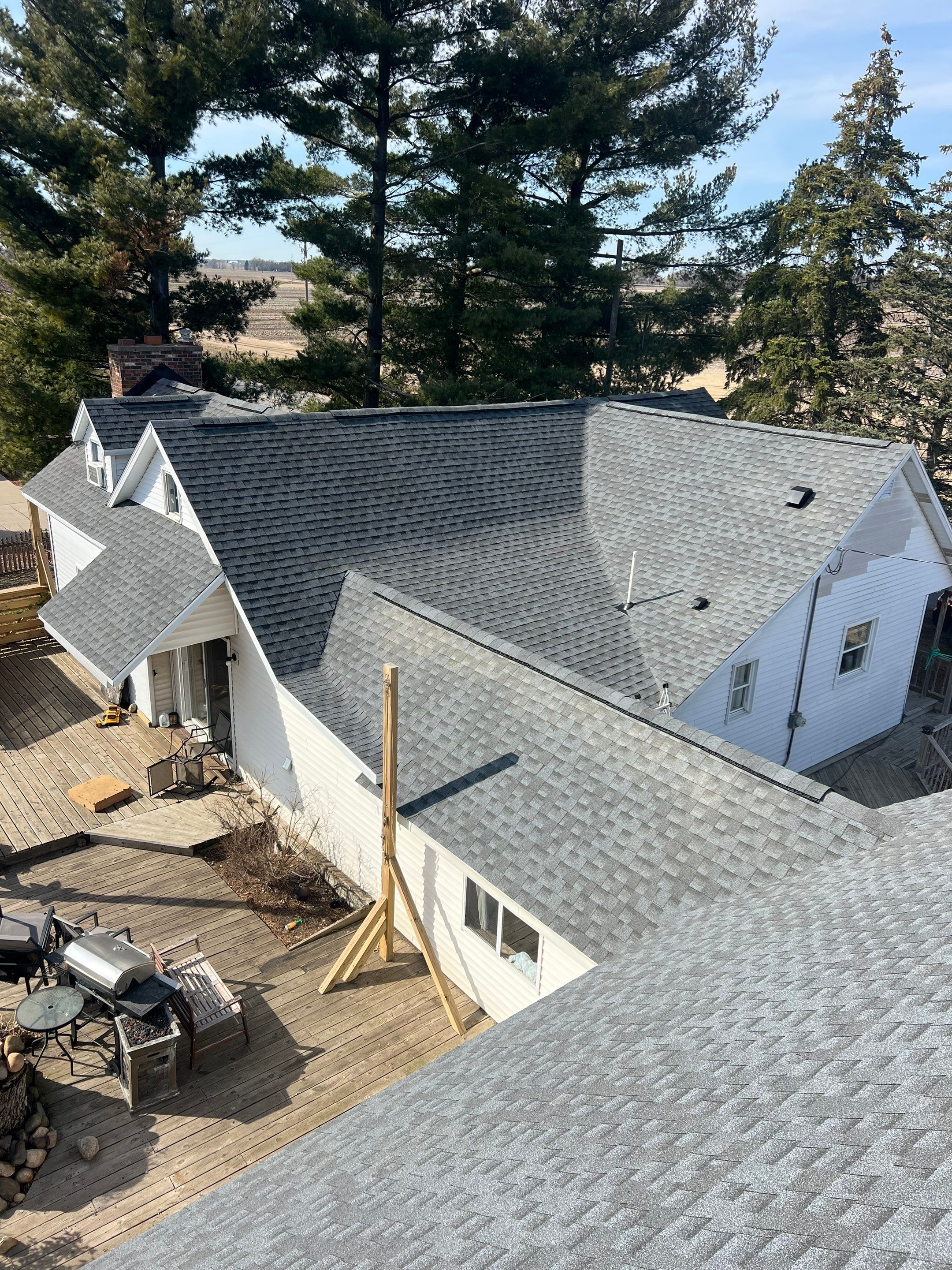 Residential Roofing Installation using GAF TIMBERLINE HDZ Pewter Gray by Avalon Roofing and Exteriors