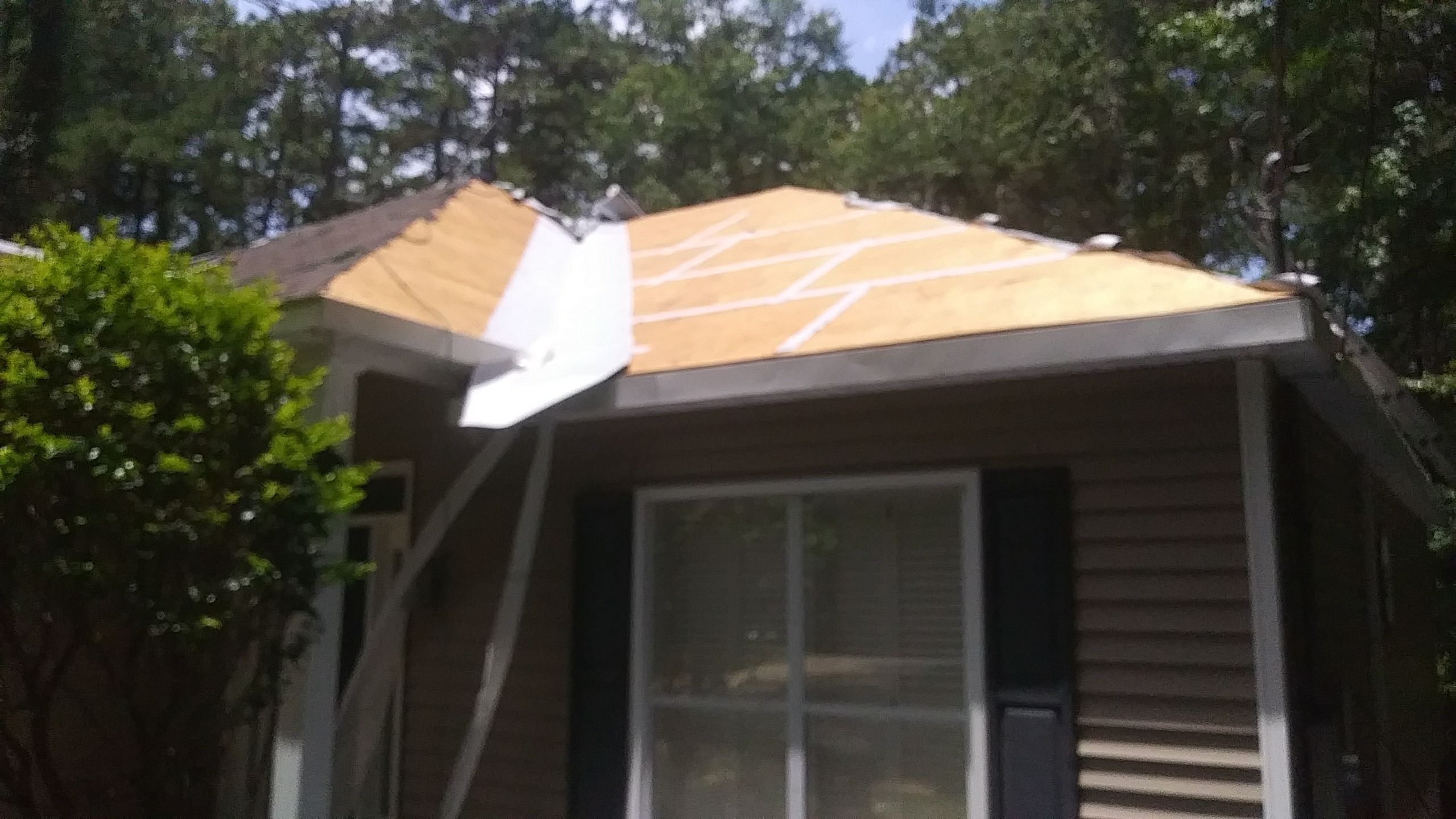 Residential Roofing Installation using Roof Replacement by American Roofing & Construction LLC