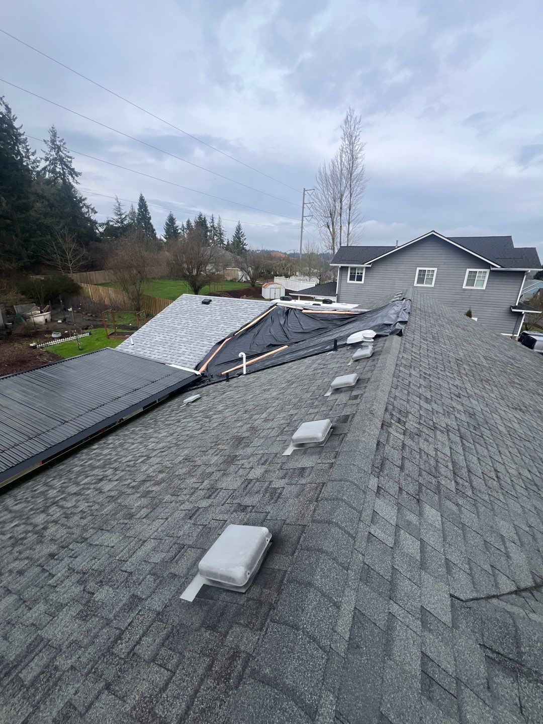 Residential Roofing Installation using IKO Cambridge (Color: Dual Grey) by Orezona Building & Roofing Company, Inc.