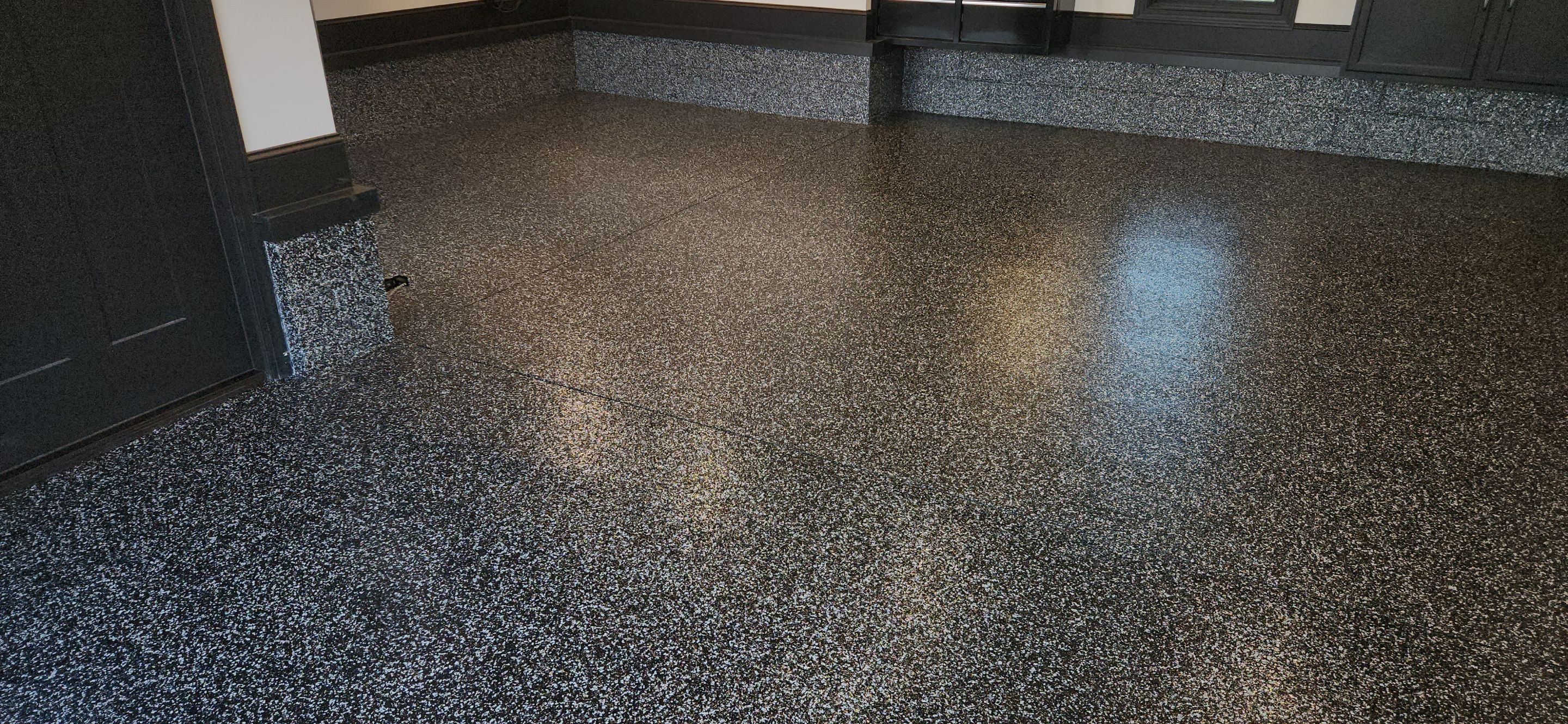 Garage Transformation Using Raven Flake With Silver Mica! by Elite Floor Solutions