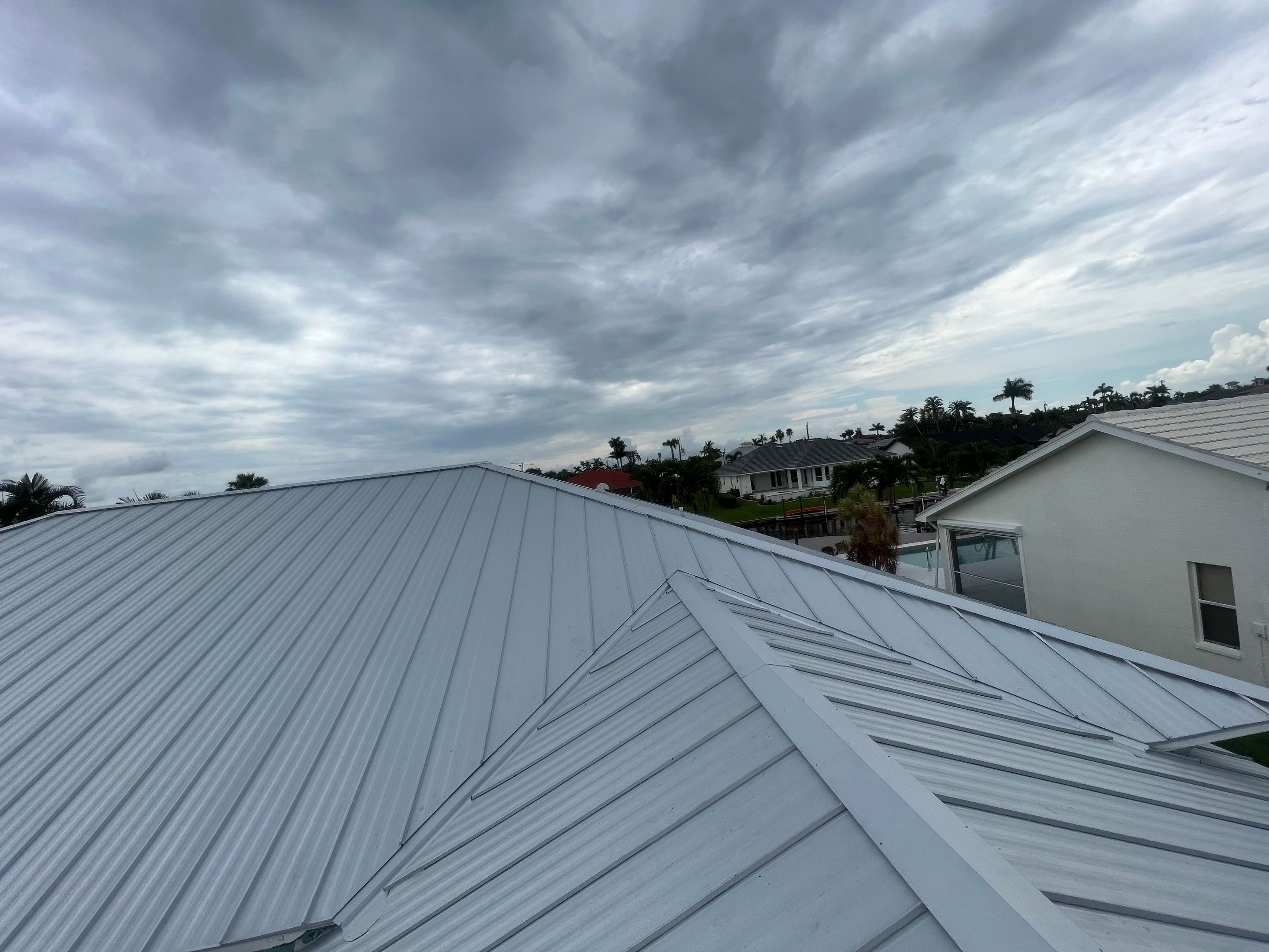 Residential Roofing Installation using Standing Seam Metal by Protek Roofing Heating Air & Solar
