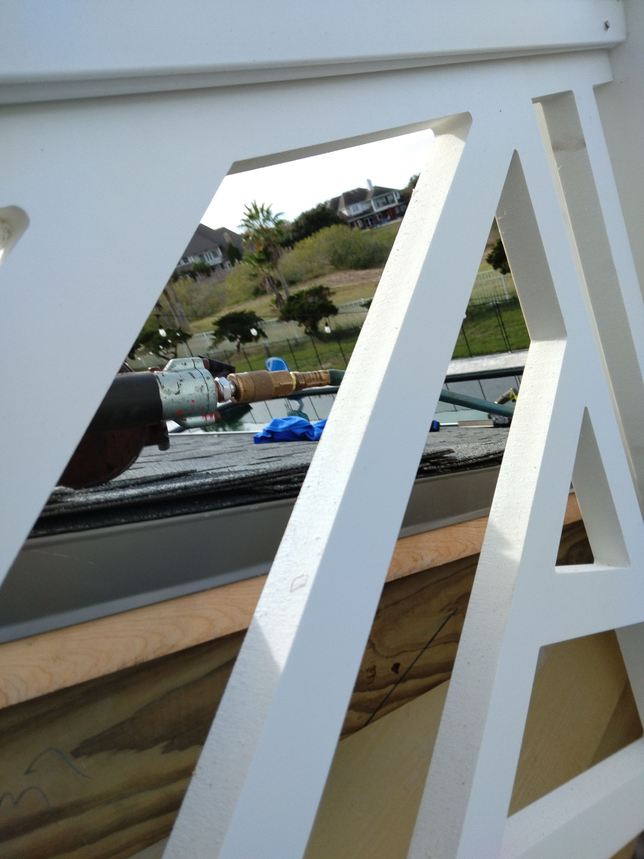 Chippendale Railings by Bayfront Roofing and Construction