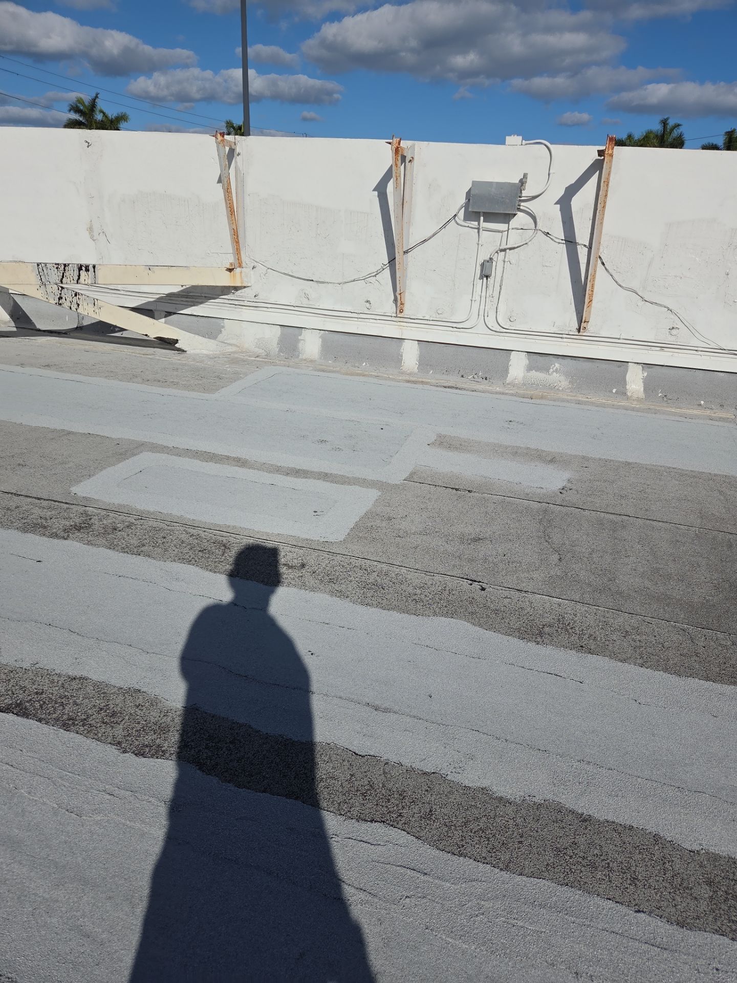 Commercial Flat Roof Restoration Using Silicone Coating in Hallandale Beach by Aastro Roofing