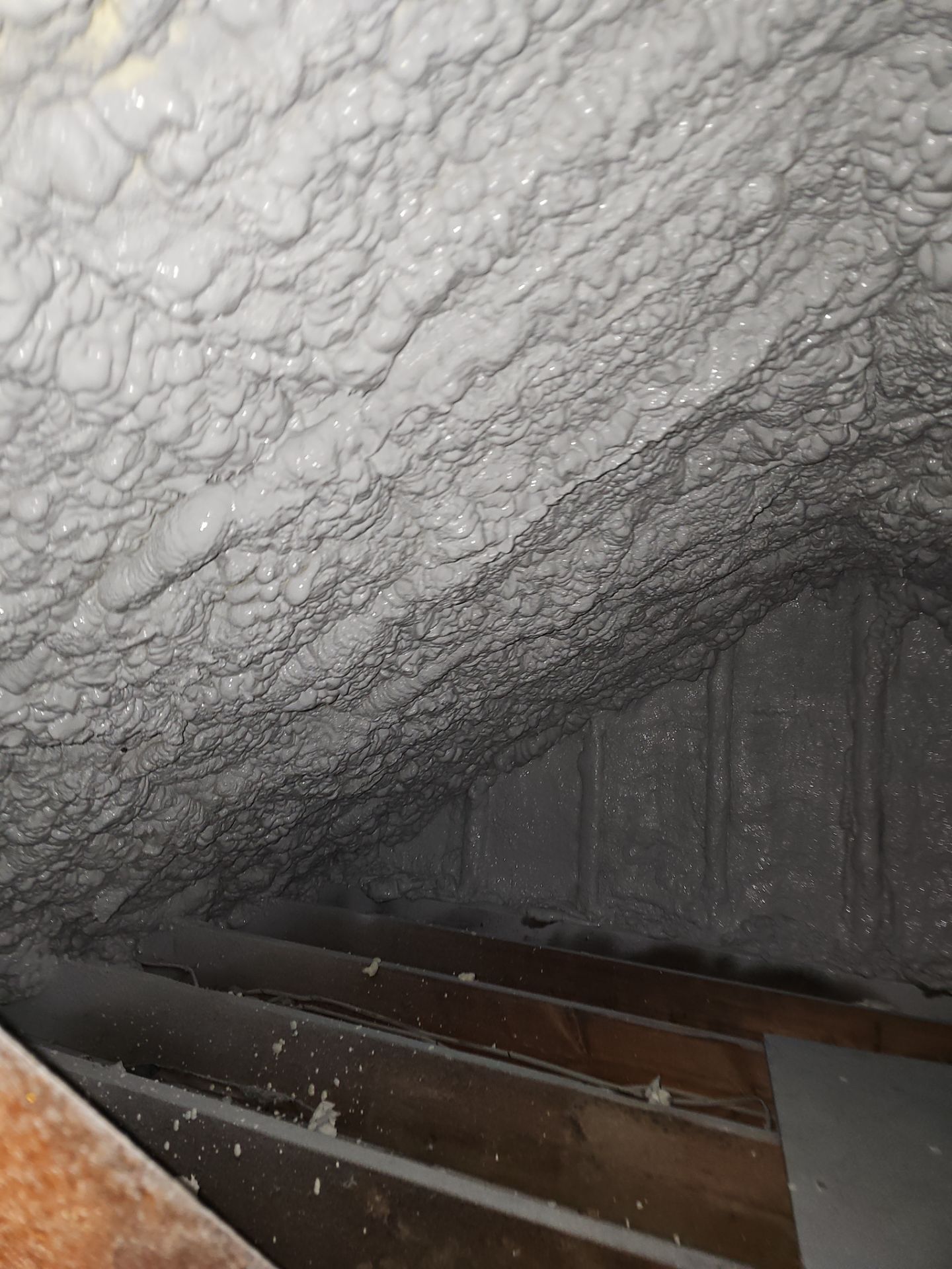 Attic Retrofit using open cell spray foam by NYS Foam & Energy