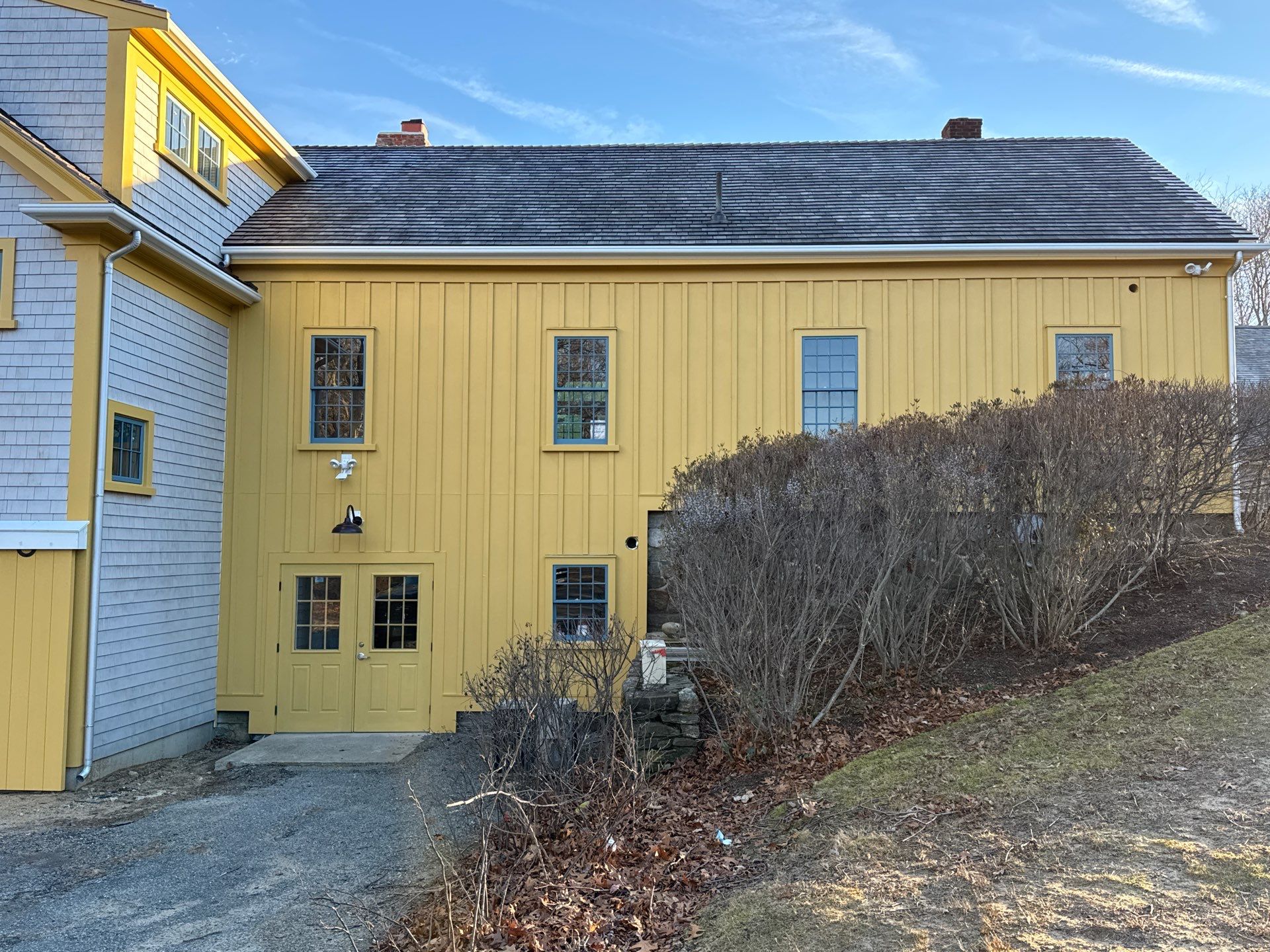 4x6 Fiberglass Gutter Installed with Round Smooth Galvalume Downspouts in Duxbury, MA by Gutter Pro Enterprises
