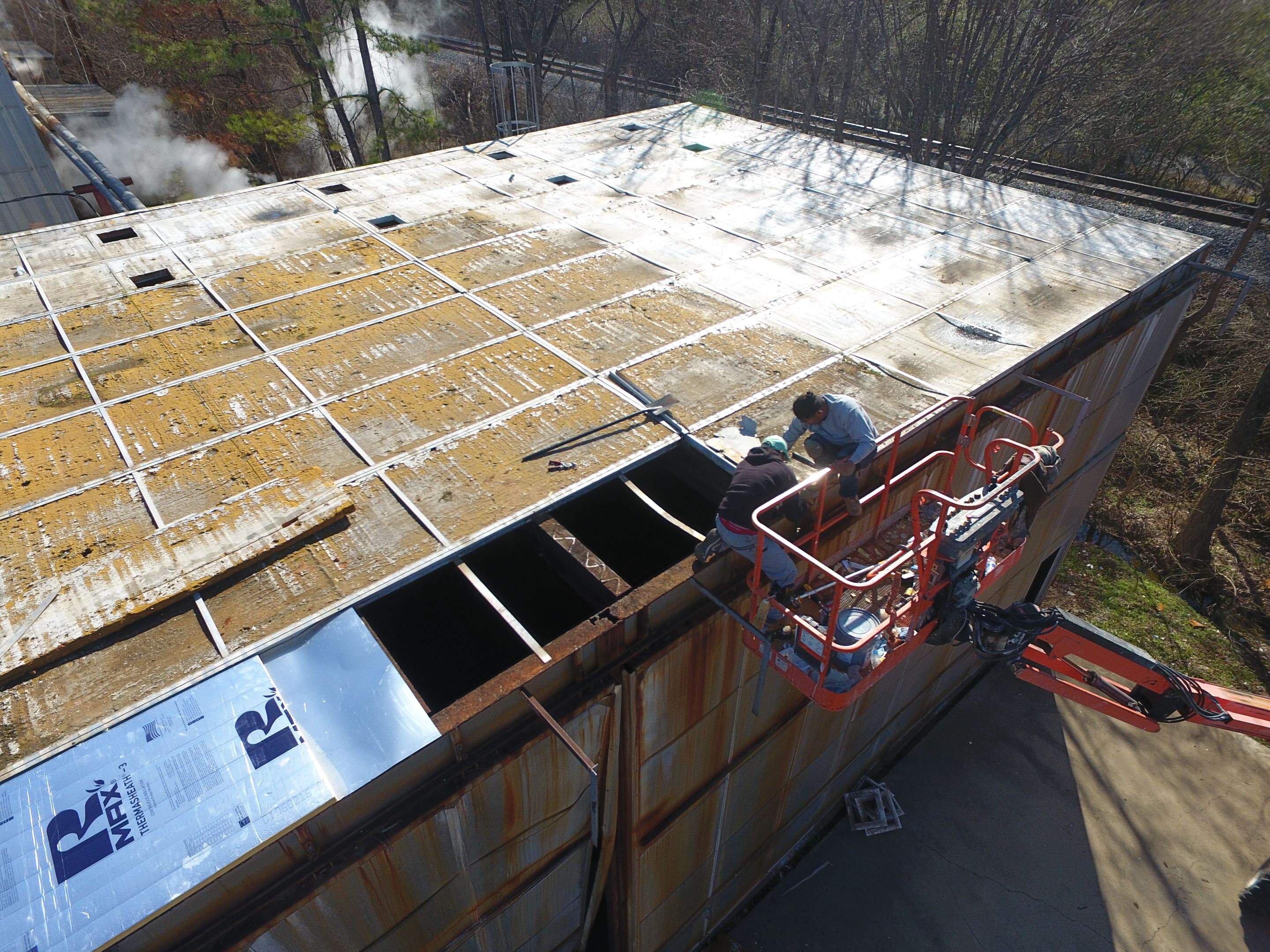 Commercial Roofing Installation using Aluminum Roofing panels by Hostetler Roofing