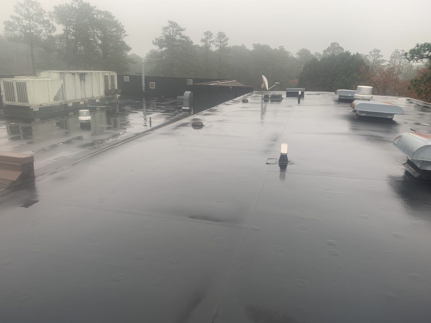 Re Roof (TPO) by American Roofing NC