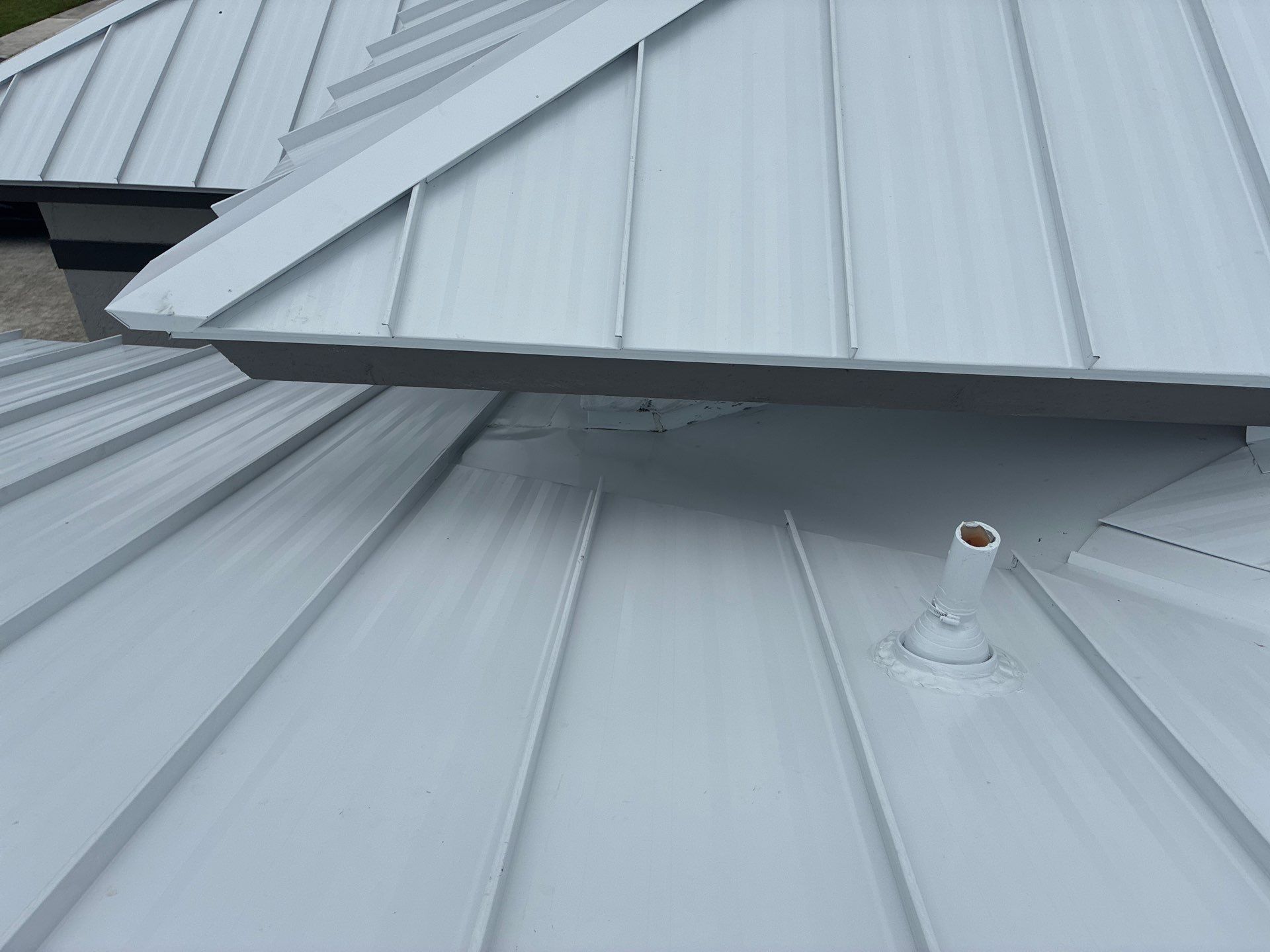 24ga 1.5" Mechanical Seam Regal White  by Total Roofing System The Metal Roof Experts