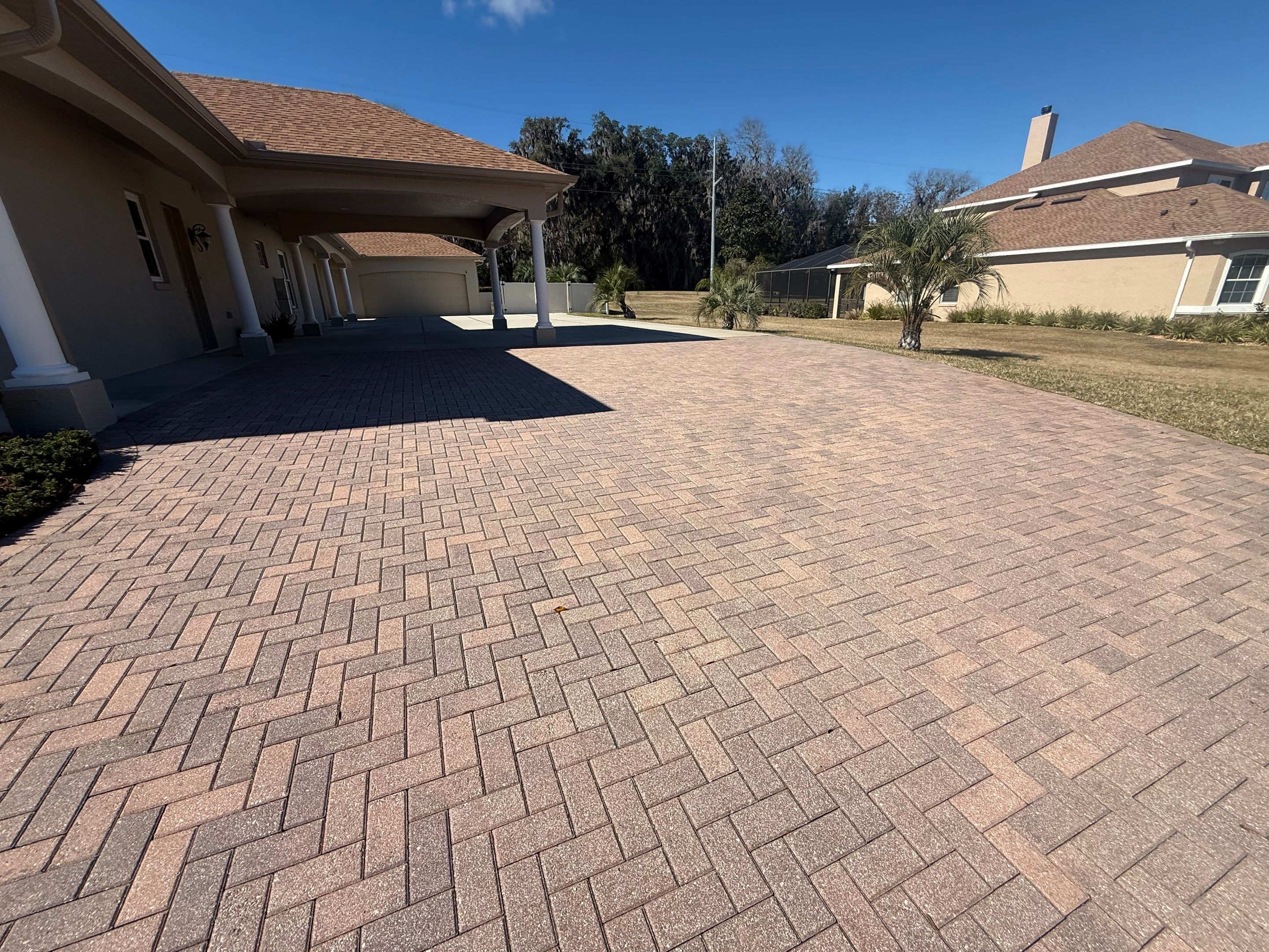 Brick Paver Sealing and Cleaning for Ocala Home and Pool Deck by Infinite Exteriors LLC