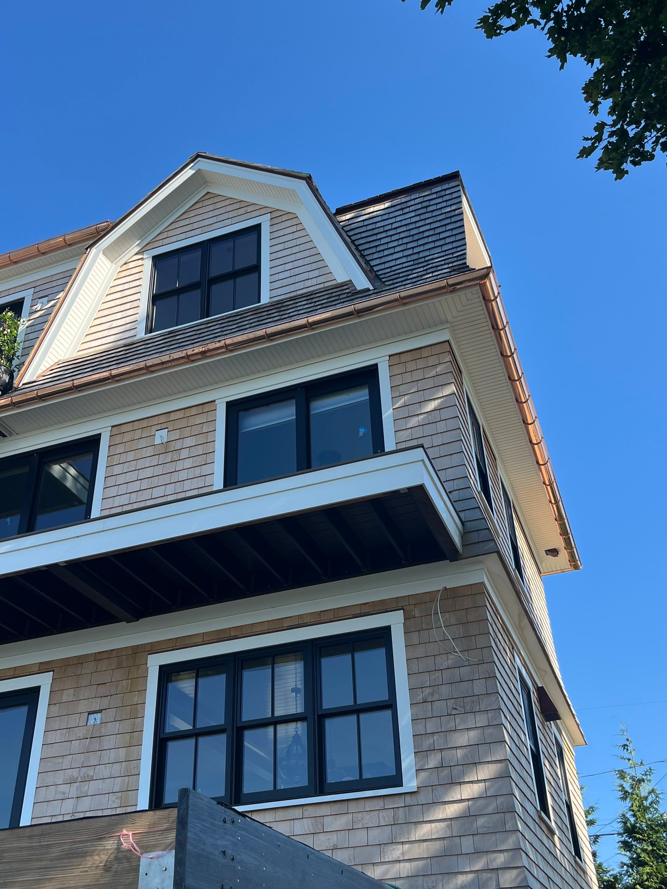 Great Island - Red Cedar Roofing, Yellow Cedar Siding, Standing Seam Copper, & Copper Gutters by Rinaldi Brothers