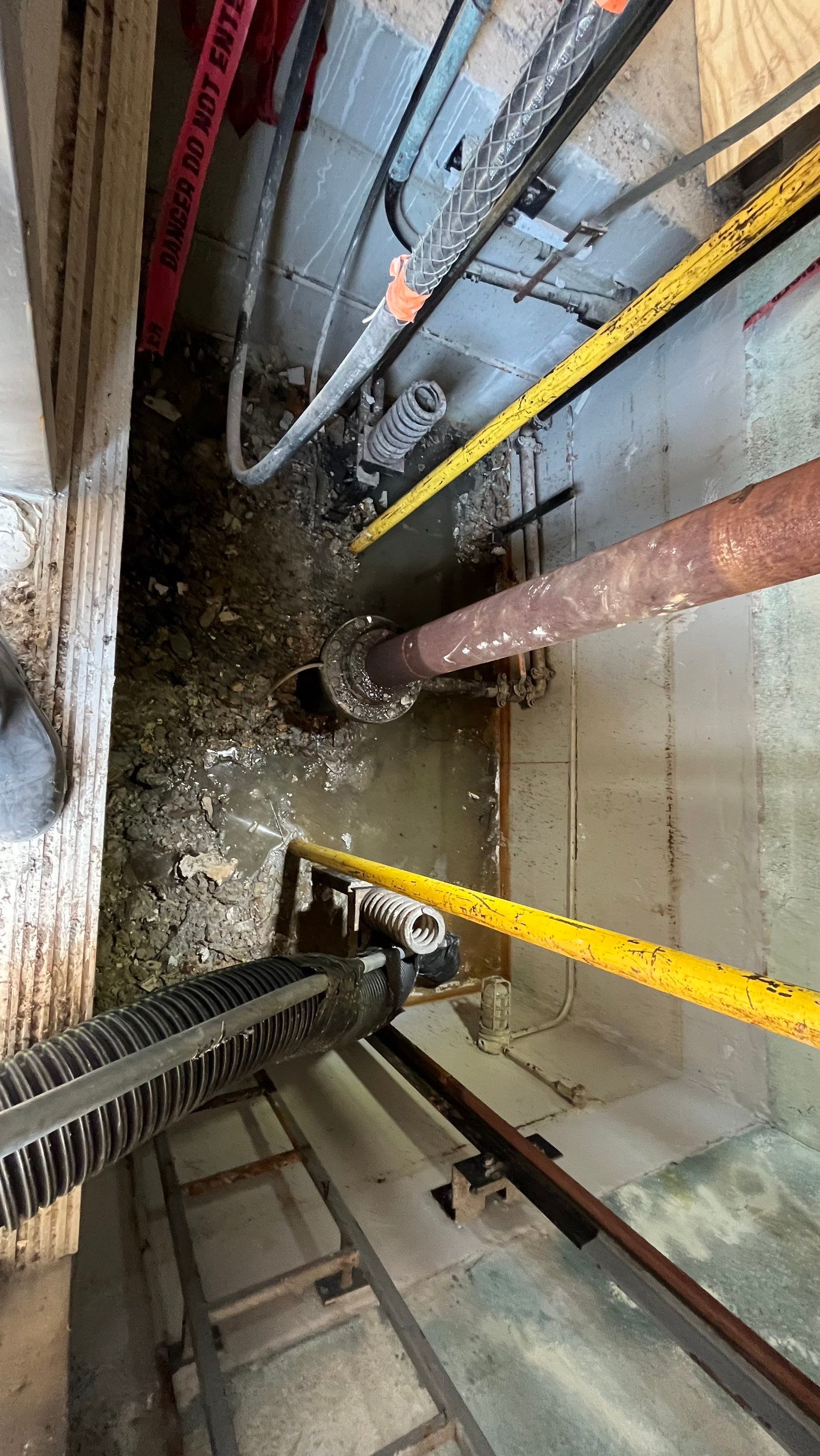Condo Elevator Shaft Clean Out and Remove Bloackage in Storm Drain System by APS Power & Water