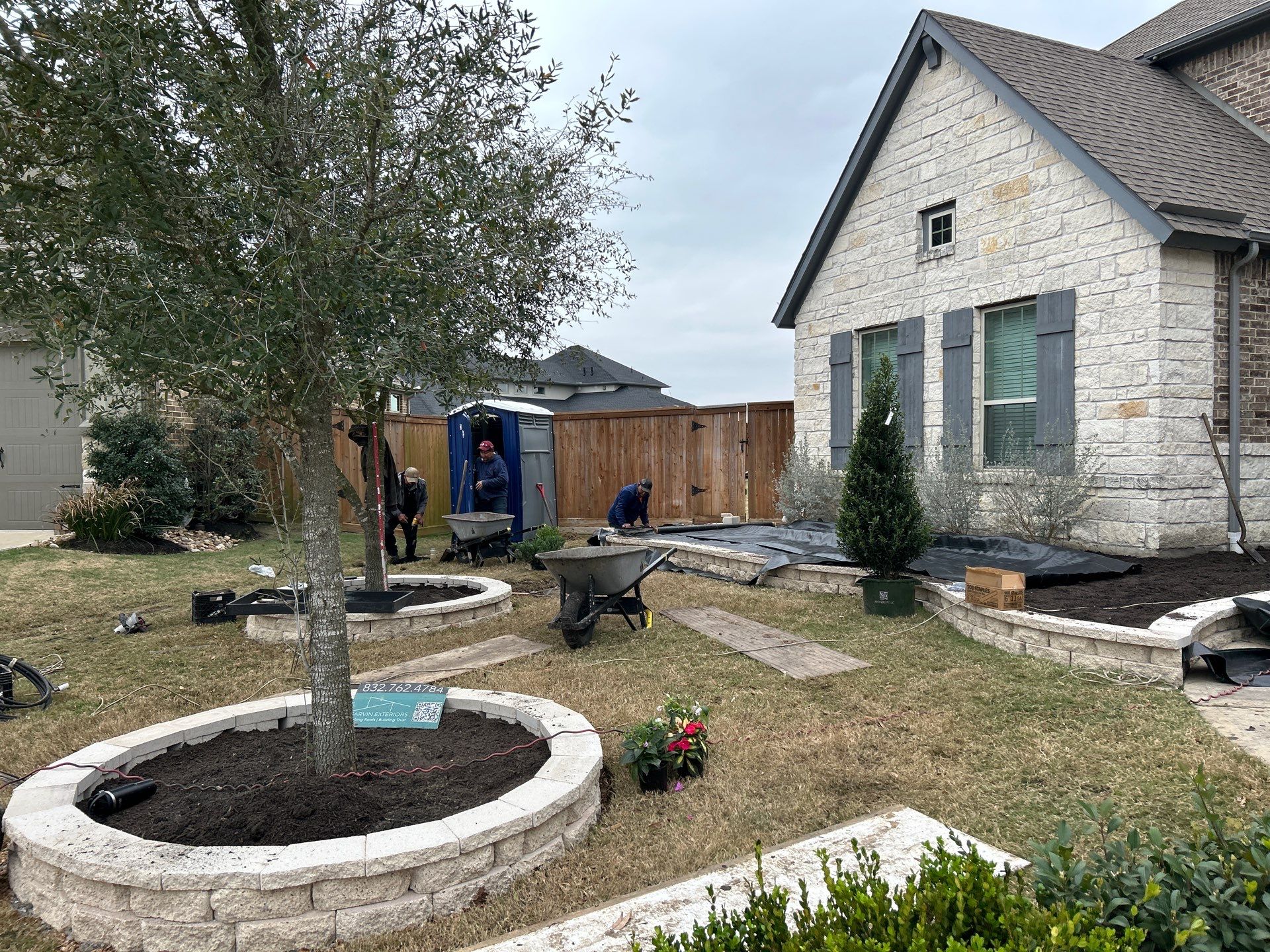 🌿✨ Darlene & Andrew’s Amazing Curb Appeal Transformation  Some projects are more than just landscaping—they’re a conversion of curb appeal from the ground up. For Darlene & Andrew, Alejandro and the Texas Urban Team designed and delivered a complete solution that reshaped their flower beds, solved drainage challenges, and gave new life to the sideyard.  💡 From planning to execution, every step was tailored to build both beauty and functionality:  🌸 Flower Beds, Reinvented  Demolition of old beds, plants, and mulch.  Fresh soil preparation, weed protection, and a brand-new retainer wall built with hand-cut stone and decorative caps.  Carefully selected plants and garden mix to ensure health and visual harmony.  💧 Drainage & Irrigation Upgrades  Outdated corrugated pipes replaced with PVC drainage lines to carry water safely away from the foundation.  New irrigation system combining drip lines and sprinklers—watering plants while keeping the house walls protected.  Sideyard drainage extended with catch basins and PVC piping to prevent water pooling and foundation stress.  🚶 Functional Sideyard with Walkway & Trash Area  Graded and leveled sideyard to manage runoff.  Installed a modern gravel and paver walkway for easy access.  Built a firm and tidy concrete-paver pad for trash containers—making the space both practical and polished.  🛠️ Stonework & Craftsmanship  Every stone in the retainer wall was cut, set, and secured by the team of handcrafters, ensuring a durable build that doubles as a design statement.  ✅ Outcome: Darlene & Andrew’s property now has better drainage, a clean and organized sideyard, and elegant new flower beds—all designed for long-term durability and lasting beauty.  📢 Before hiring anyone, review our portfolio. Our work speaks louder than words—each project is a blend of function, protection, and design crafted to last. by Texas Urban Elements