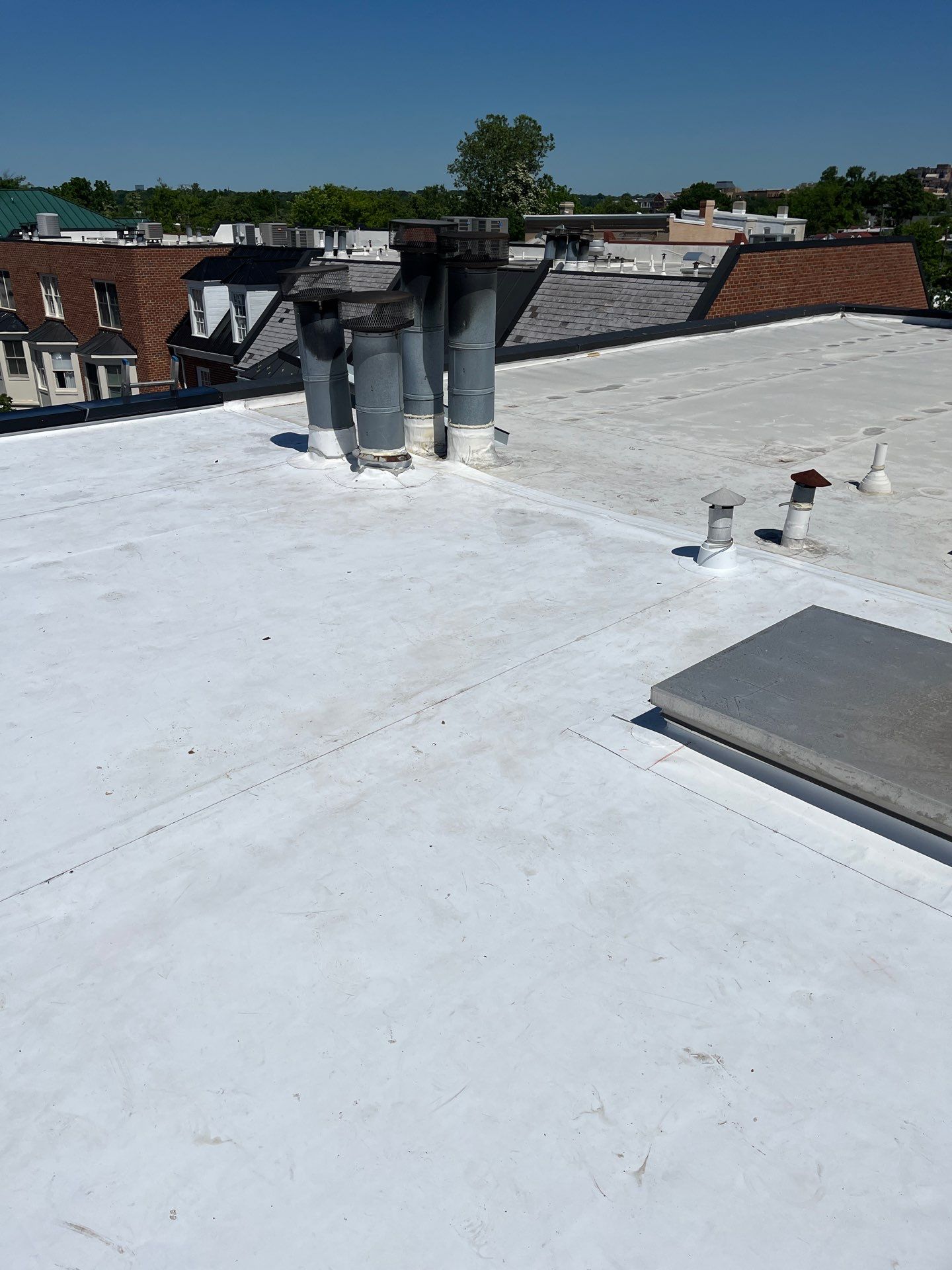 Alexandria: Carlisle Syntec TPO Flat Roof Installation by RM Banning, Inc.