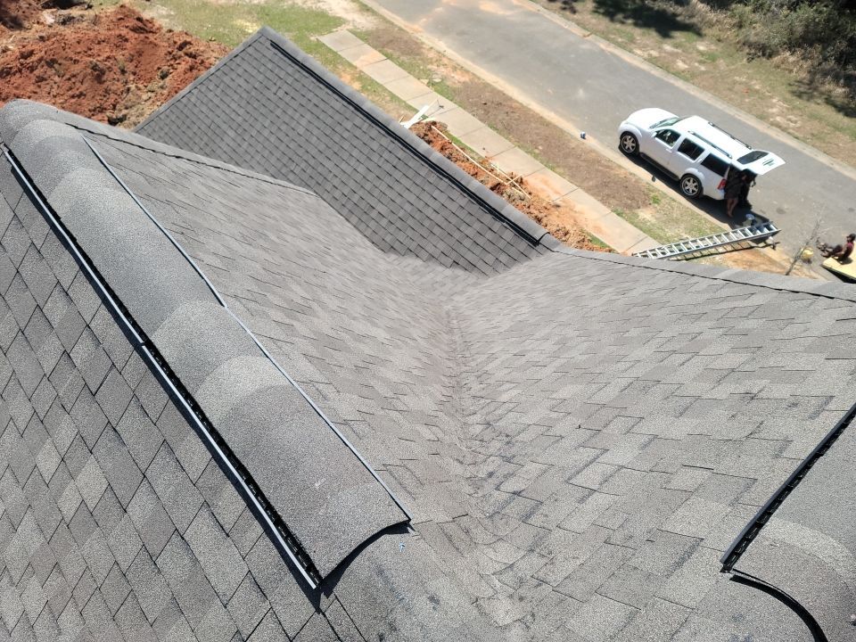 Residential Roofing Installation using Roof Replacement by American Roofing & Construction LLC