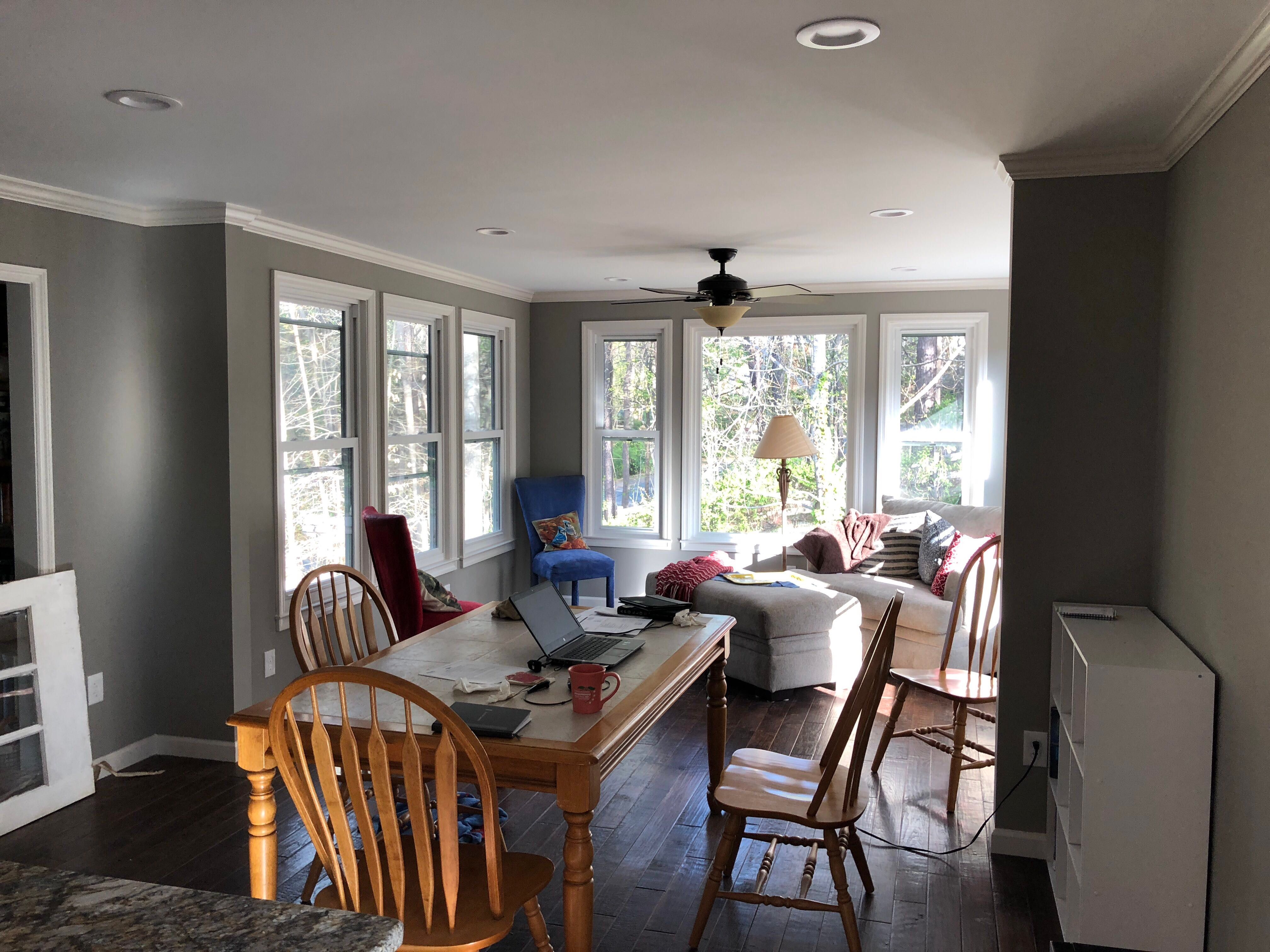 Elevated Sunroom Addition Featuring Dark Gray Siding in Kennesaw by Swift Home Renovations