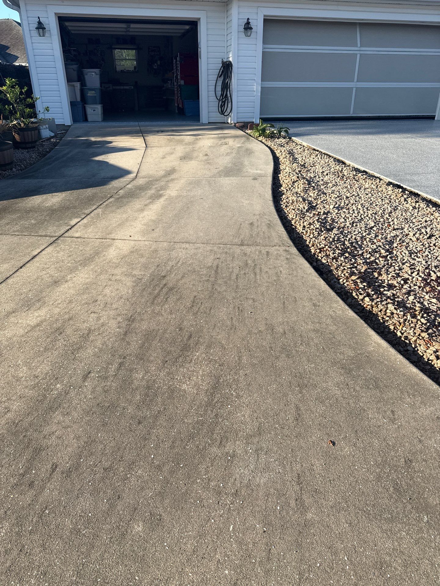 Garage, Drivewat, and Sidewalk in Landshark and Tidalwave by Innovative Concrete Coatings 