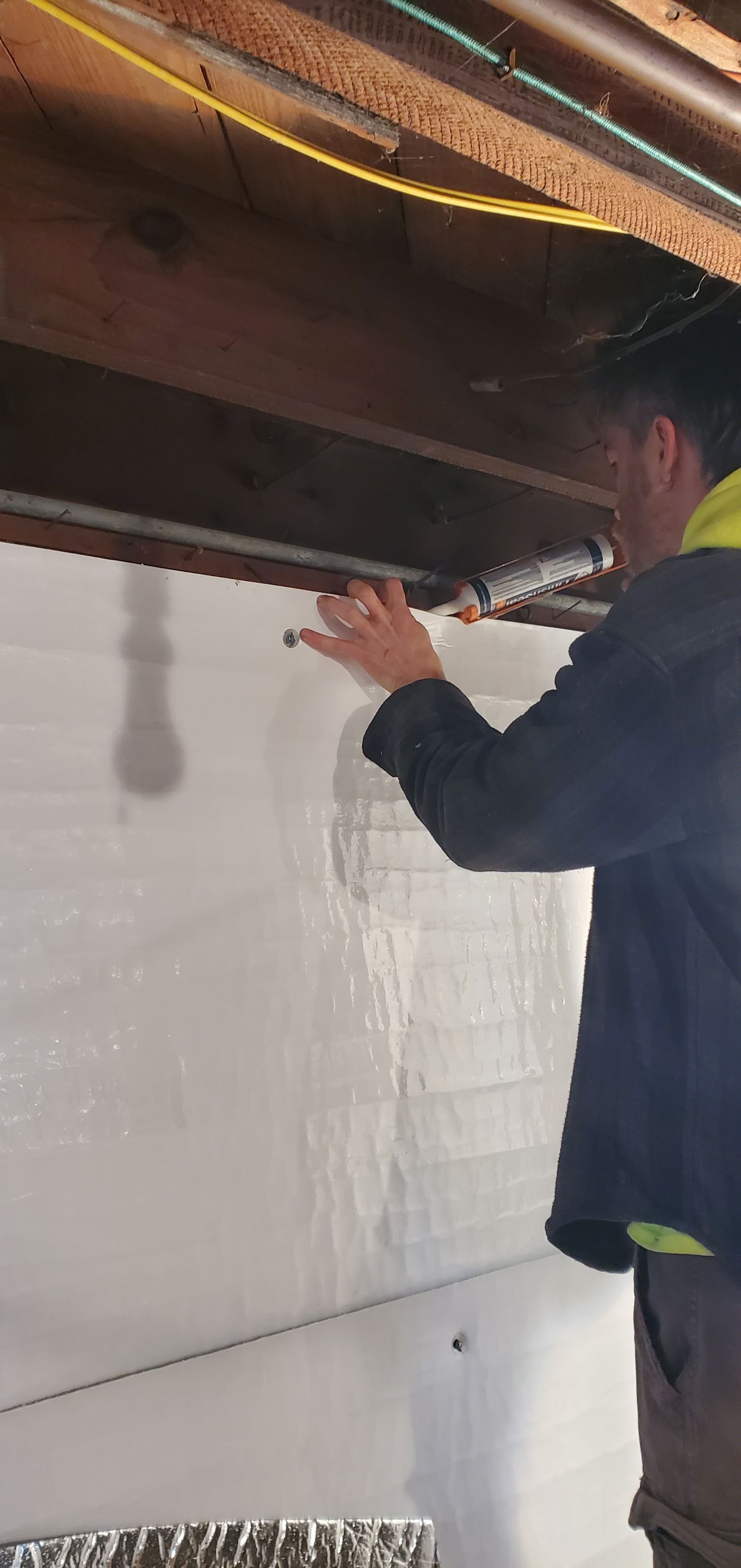 Interior Basement Waterproofing System using GrateDrain Waterproofing System by Toledo Basement Repair 