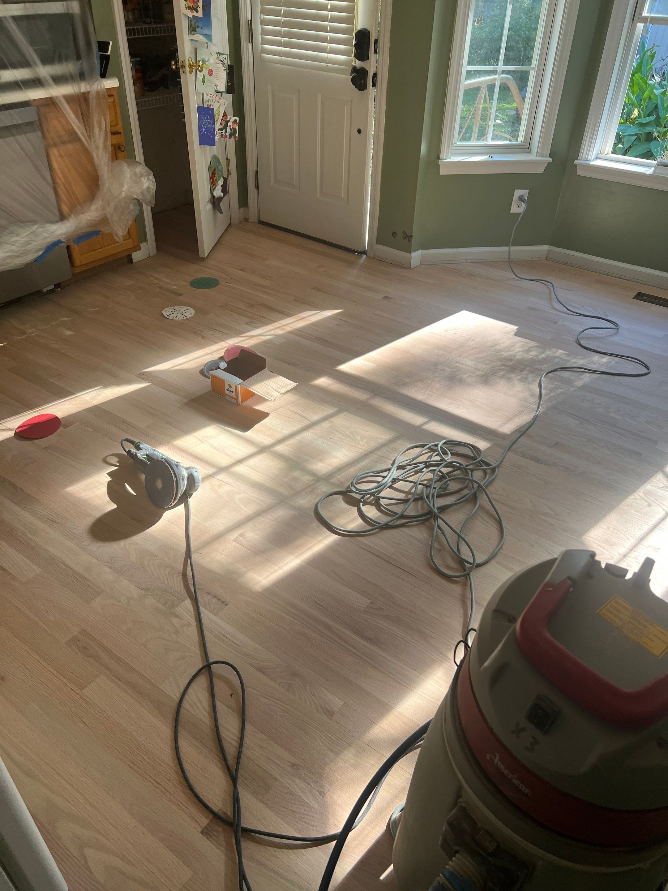 Refinishing an old Bruce prefinished hardwood floor by Accent Custom Floors