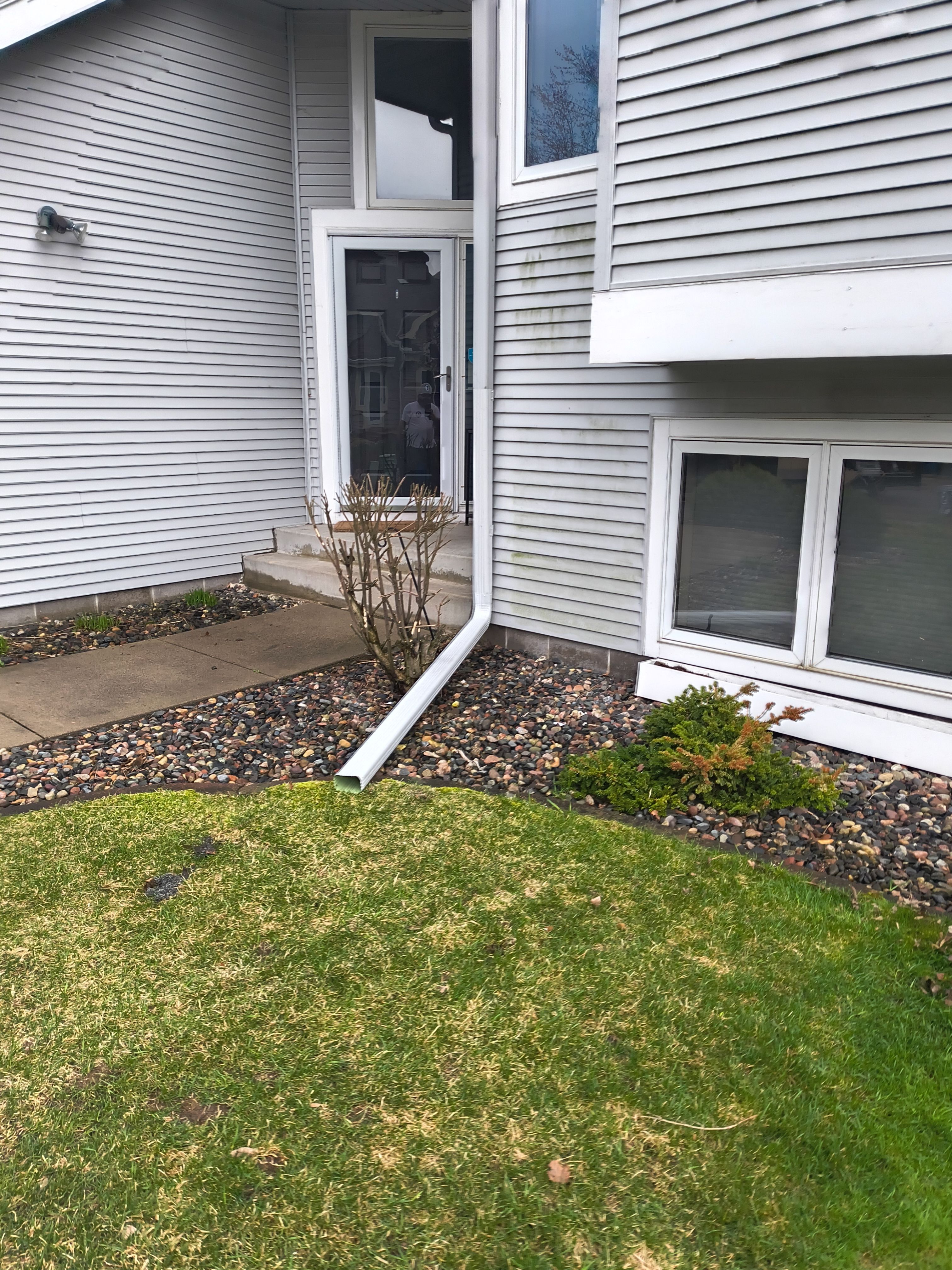Seamless Gutter Installation in Plymouth MN | White Gutters, Silver Gray Downspouts & Gutter Guards by Next Level Seamless Gutters / Exteriors Inc.