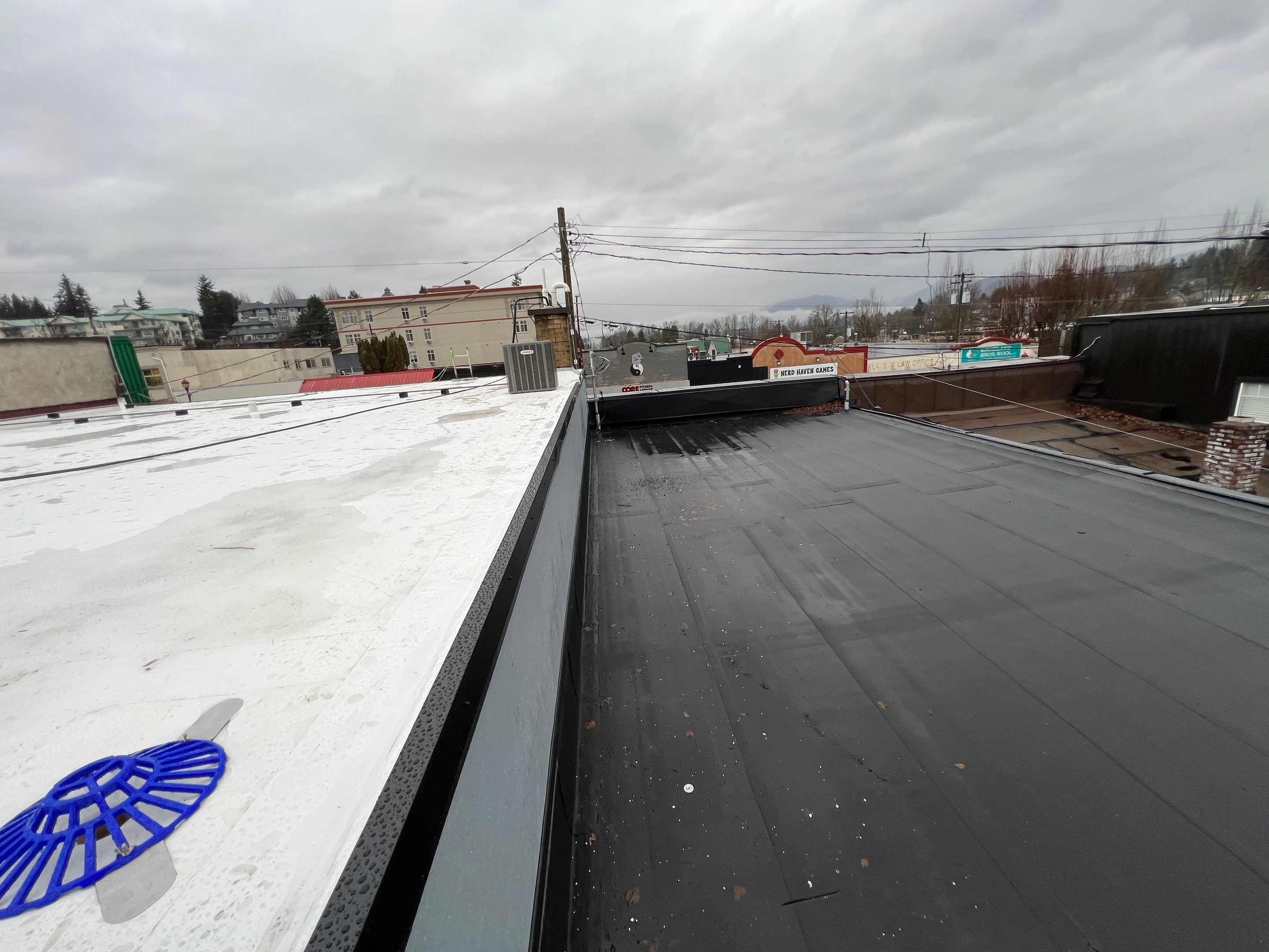 Residential ReRoofing Installation using Durolast by Top Notch Roofing Inc