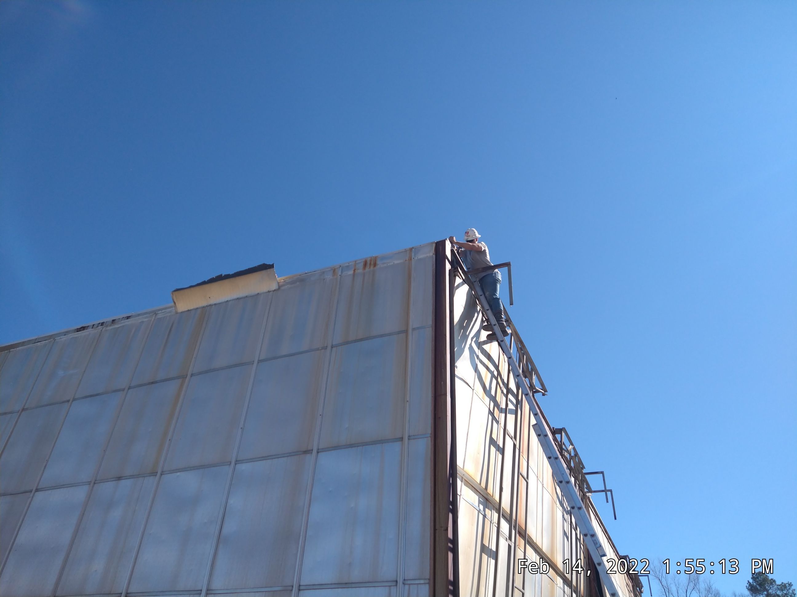 Commercial Roofing Installation using Aluminum Roofing panels by Hostetler Roofing
