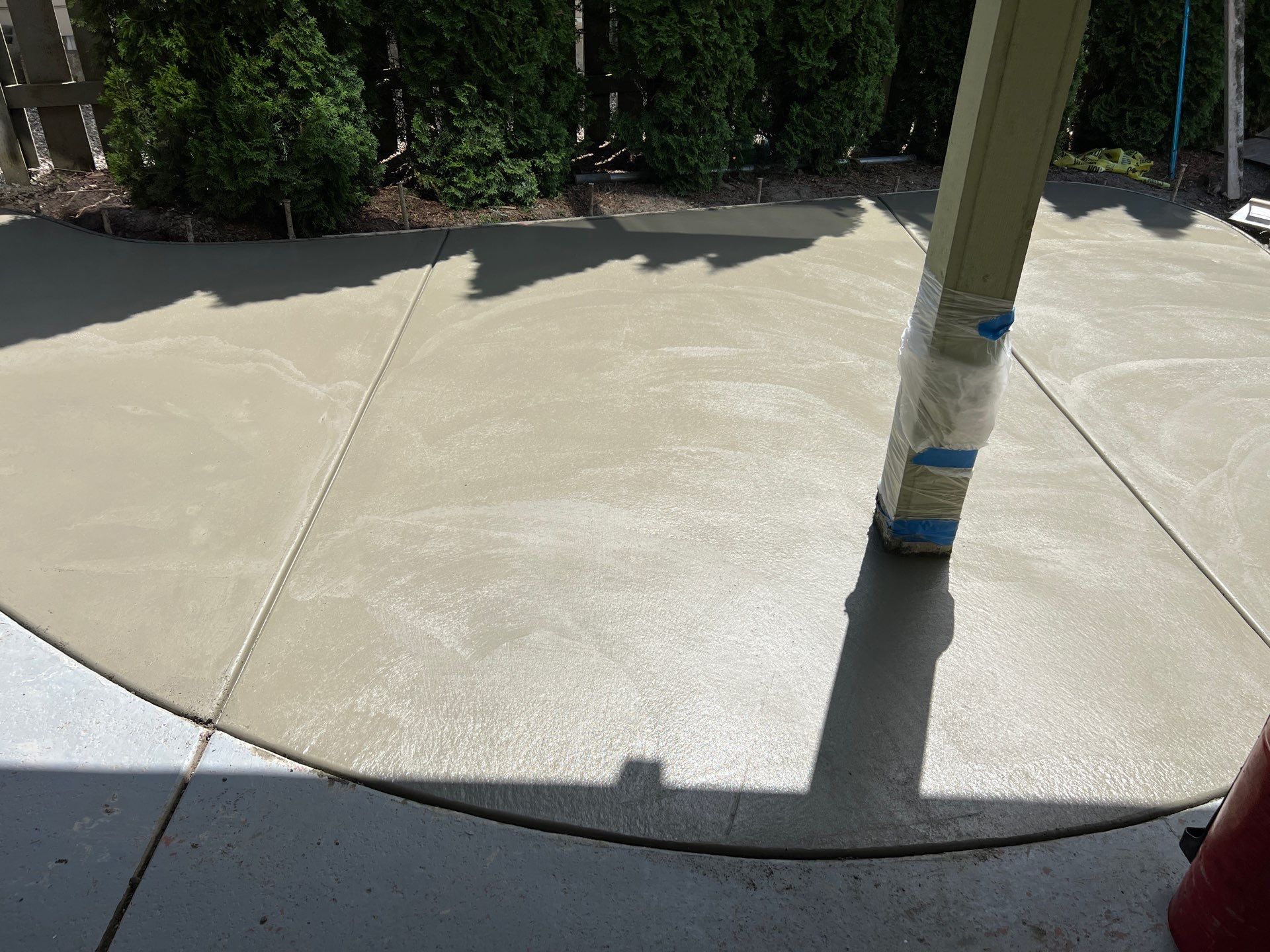Ashley | Concrete Back Patio by Jireh Asphalt & Concrete Inc 