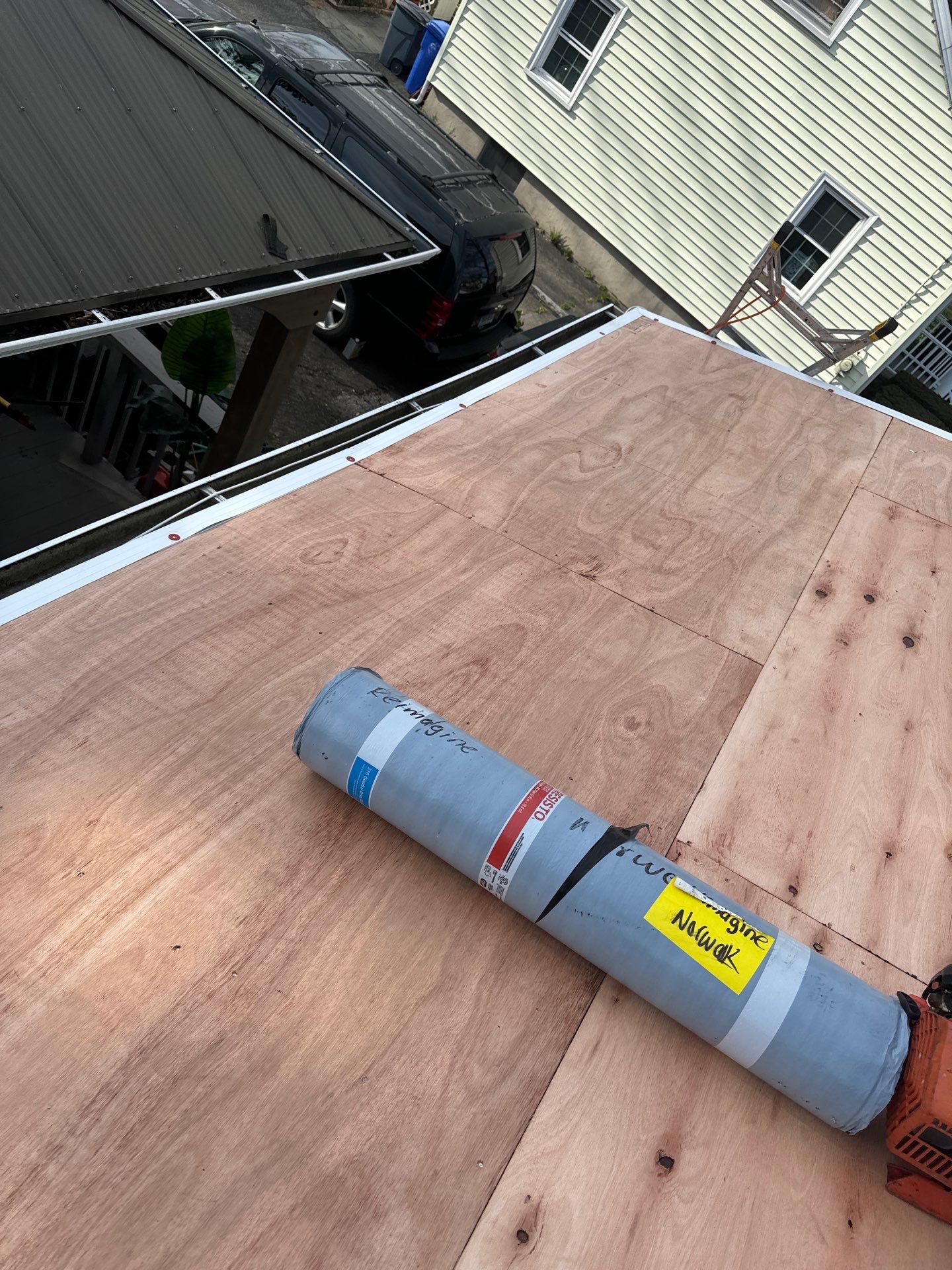 Charcoal Shingles by Reimagine Roofing