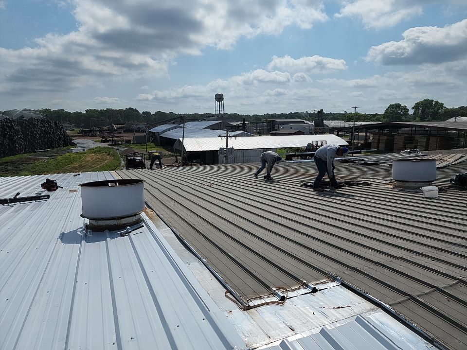 Commercial Roofing Installation using Aluminum Roofing panels by Hostetler Roofing