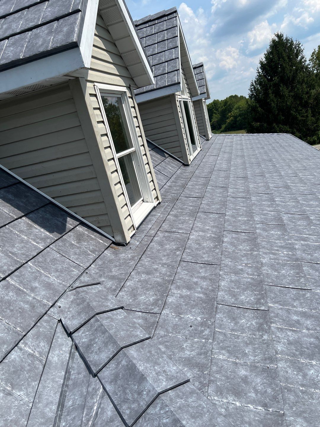 Residential Roofing Installation using ProVia Ironstone Slate Metal Roofing by RoofX 