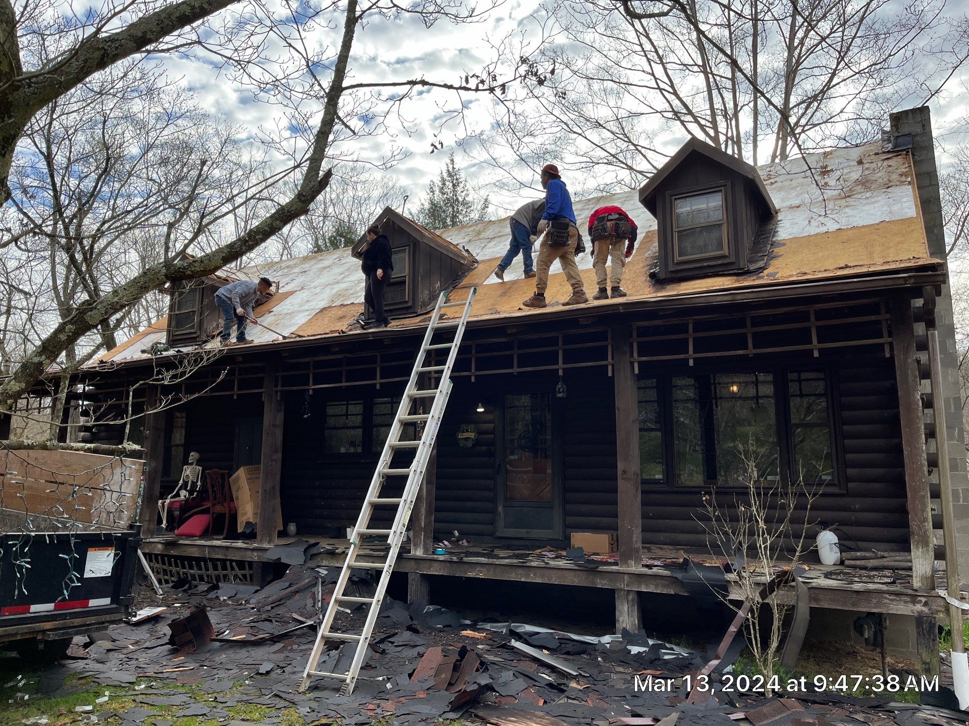 Residential Roofing Installation using Union Corrugatting Metal Roofing and Seamless Gutters by Fahey Roofing + Contracting