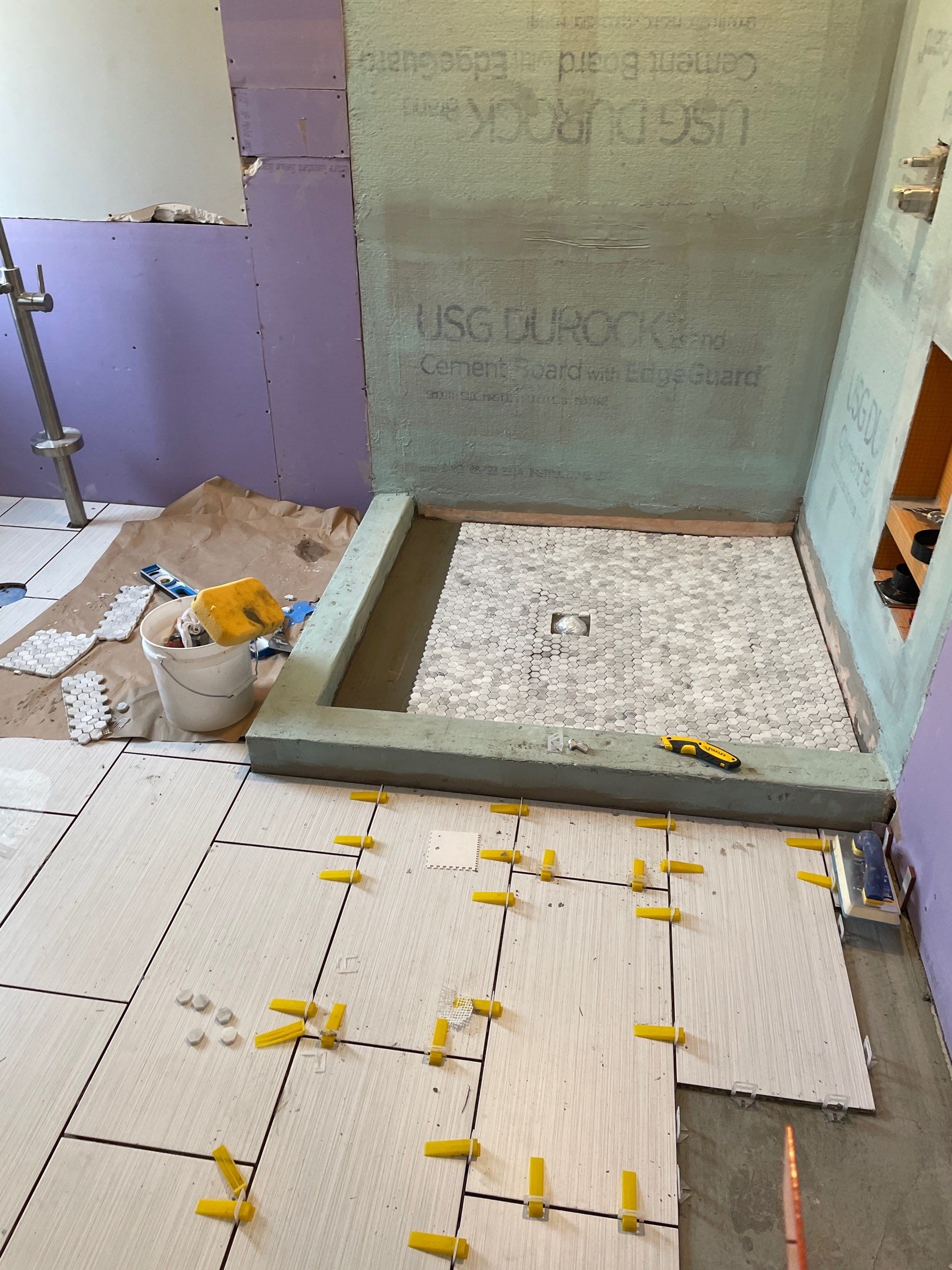 Bathroom Remodel using Schluter by Footprints Floors of Coastal Carolina