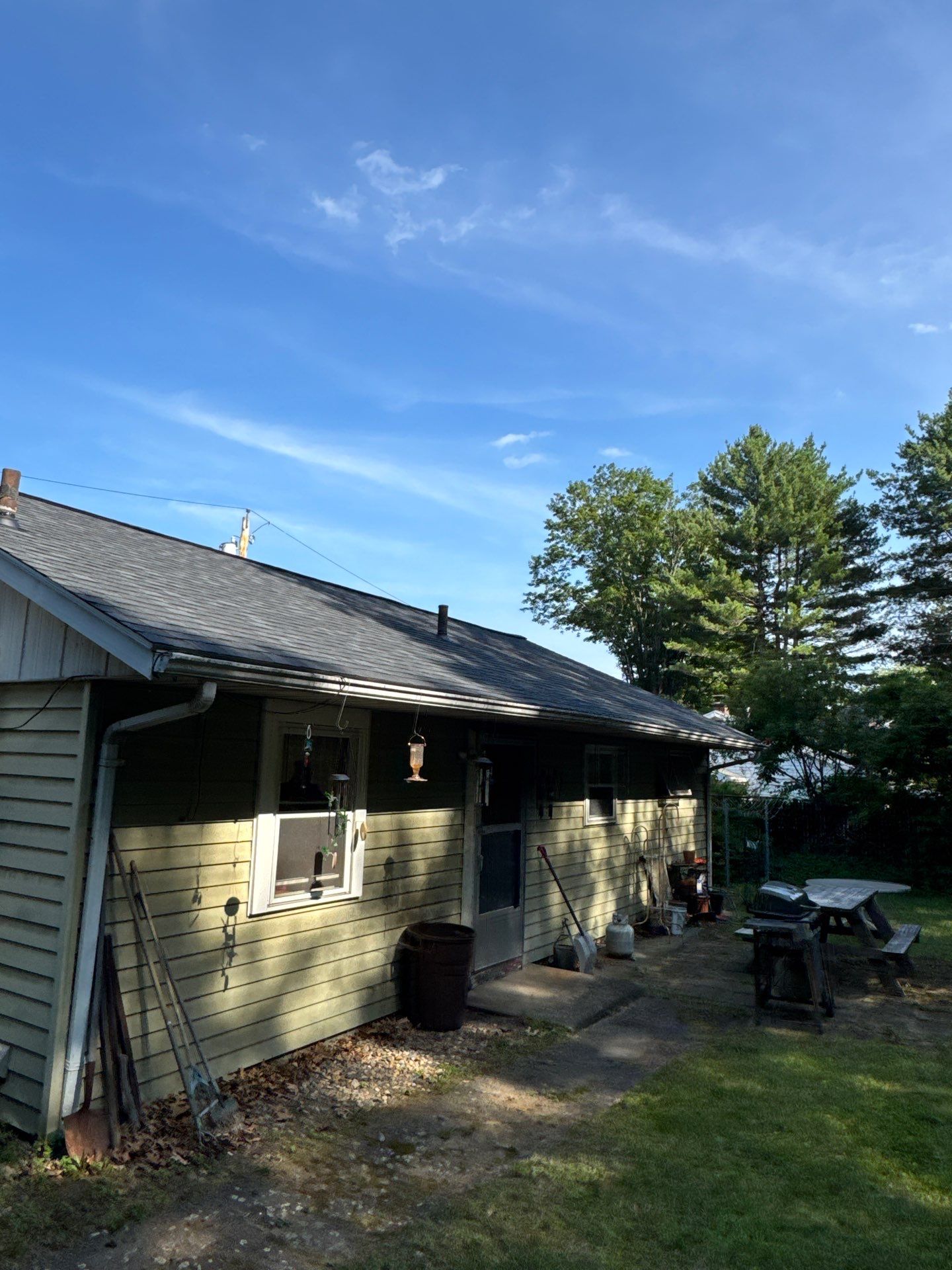 Onyx Black Roof Transformation in Maynard, MA by Mighty Dog Roofing of Greater Middlesex County