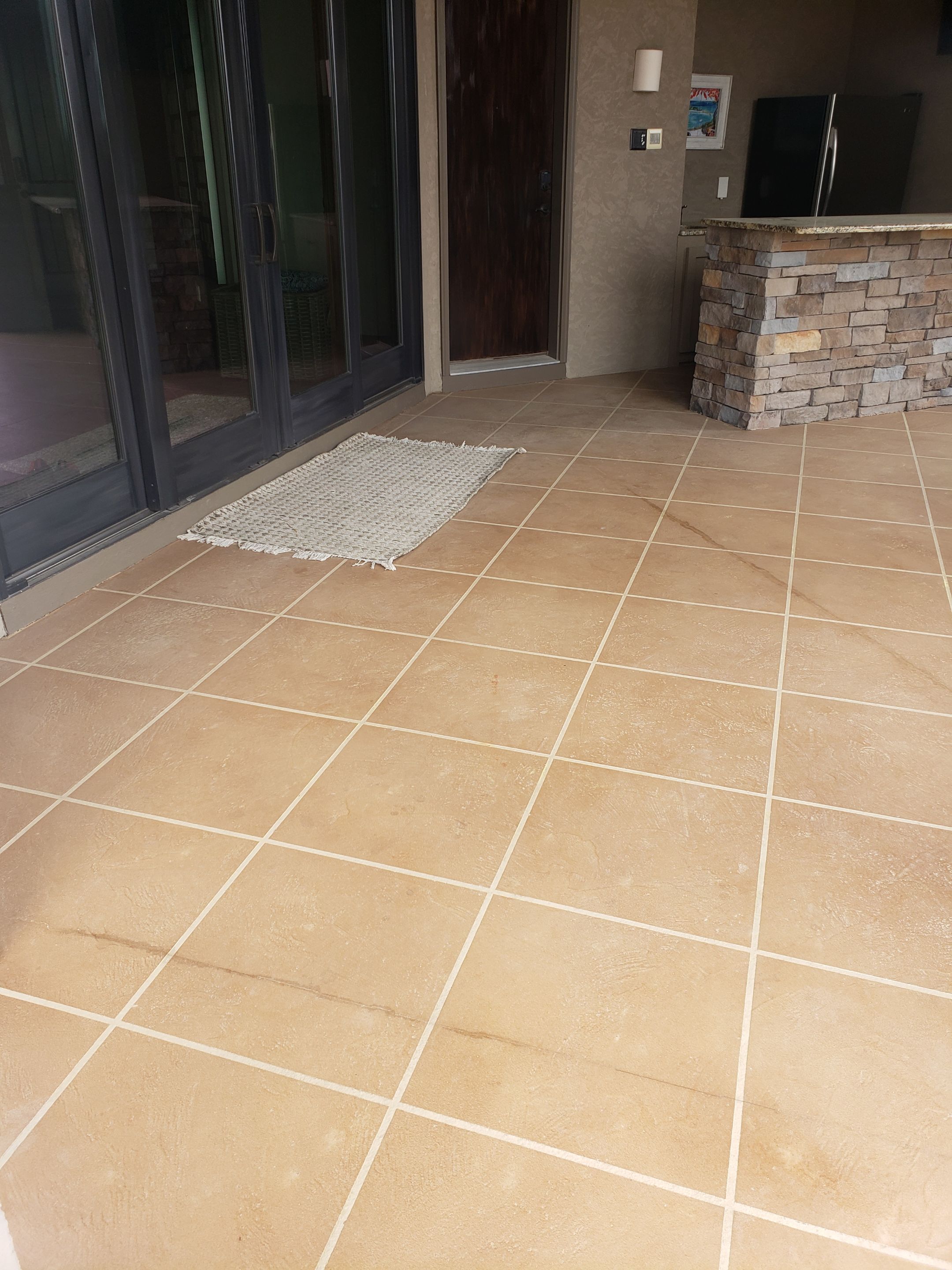 Lake Lotawana -- Front Walkway and Back Patio Tuscan Overlay by Big Red Decorative Concrete, LLC