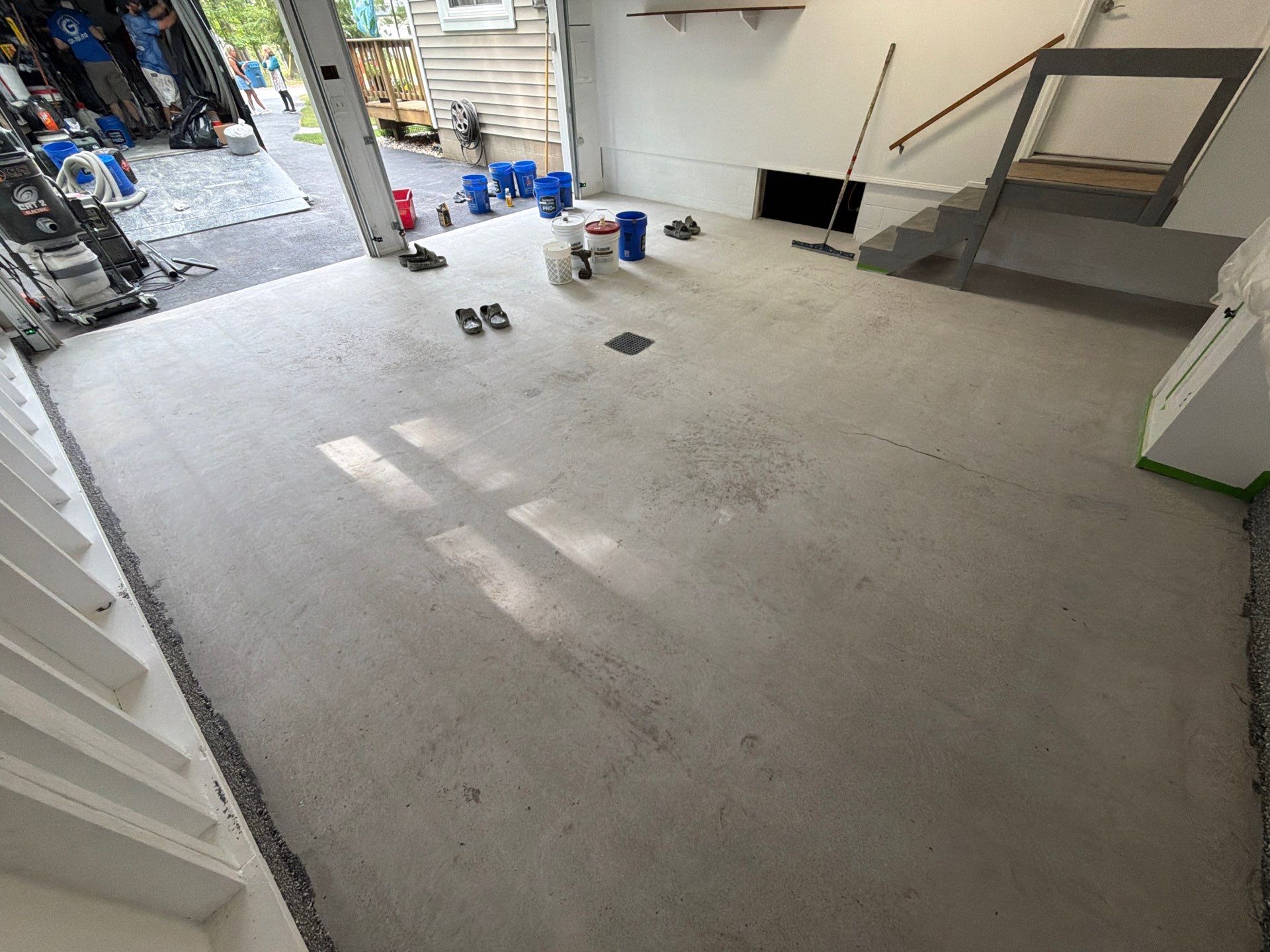 Pentwater Garage Epoxy Flake Floor Installation and Exterior Refinement by Gordon Painting