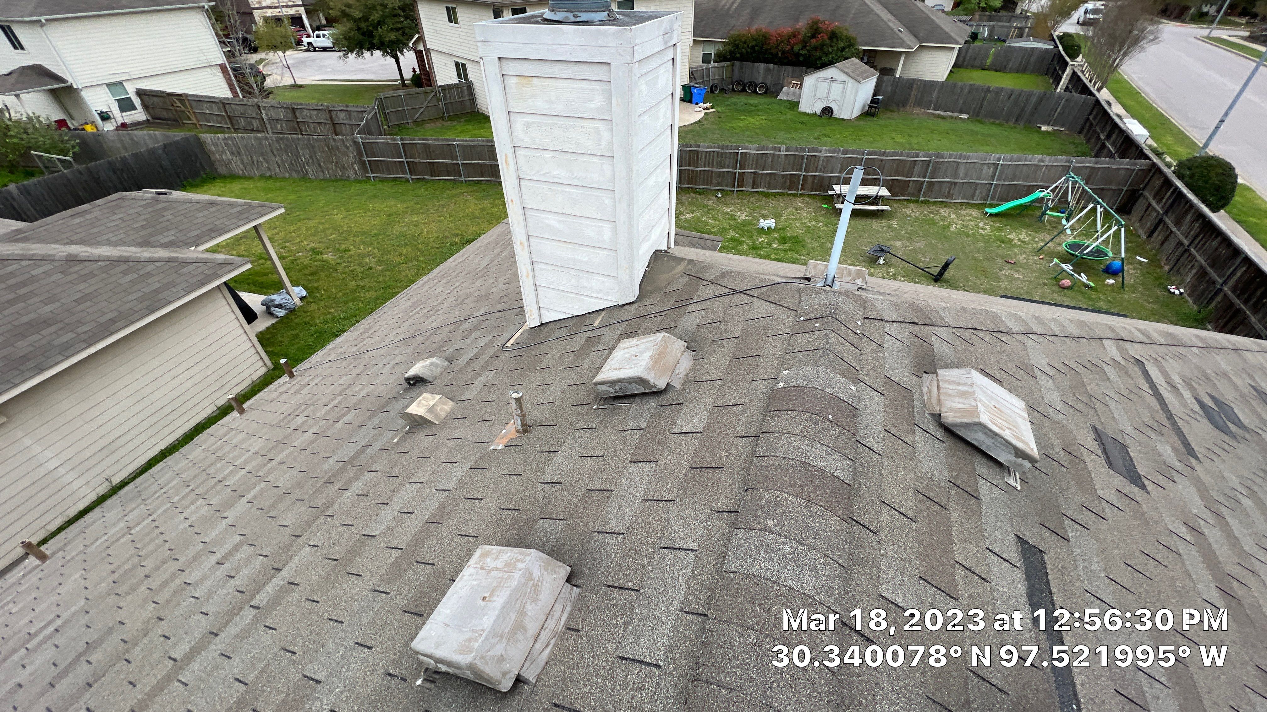 Asphalt Shingle Roof Replacement and Wind Damage Restoration in Manor by Caliber Restoration LLC