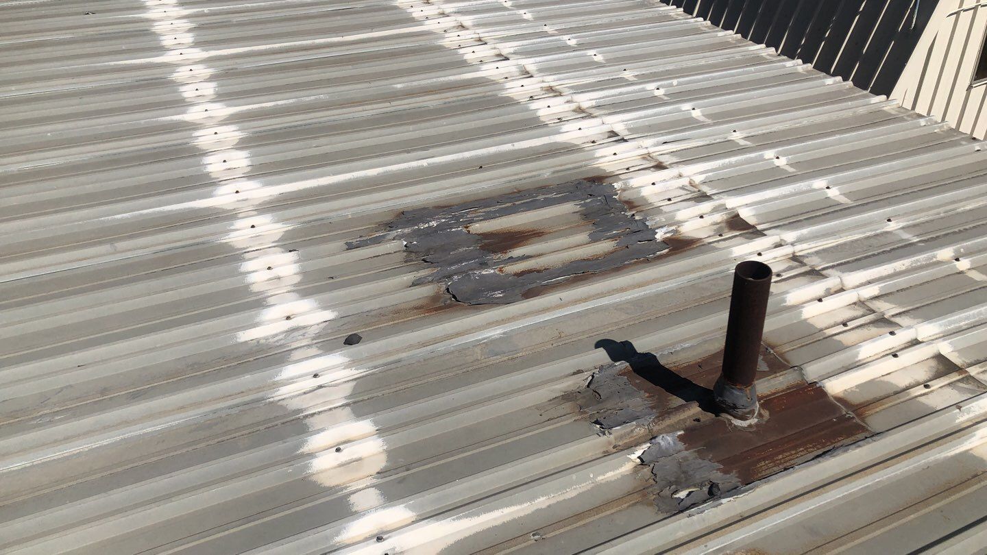 Metal Restoration Roofing system with Benchmark/PUMA XL 20 yr warranty by Straight Edge Roofing Inc